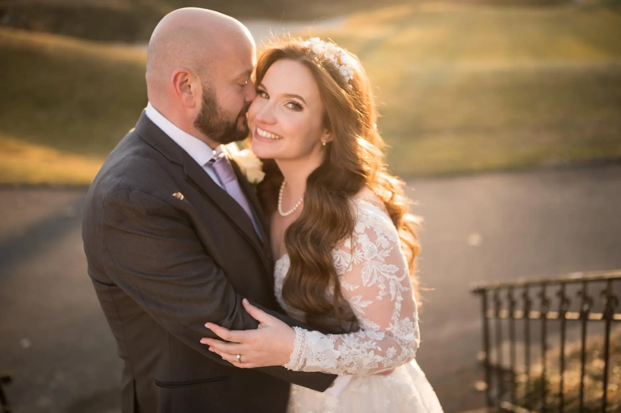 Groom with Bride in Illusion Sleeve A-Line Wedding Dress Inspired by Vintage Royalty called Raphael by Maggie Sottero