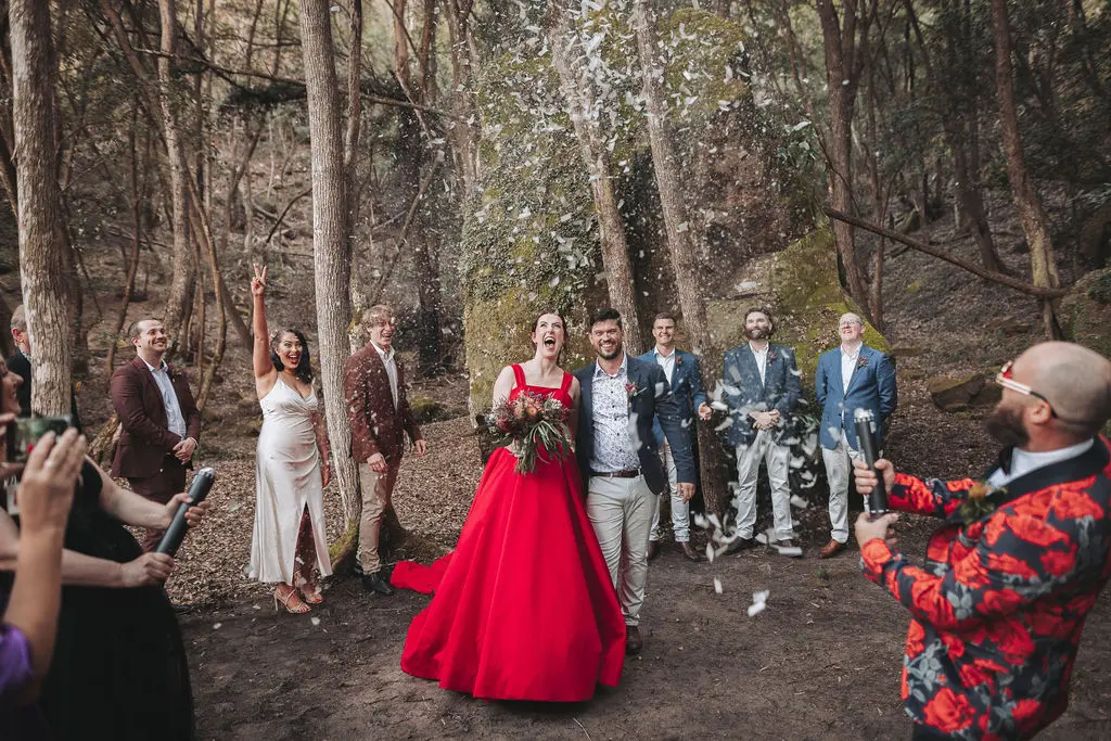 Bride In Red A-line Alera Sottero Midgley With Groom