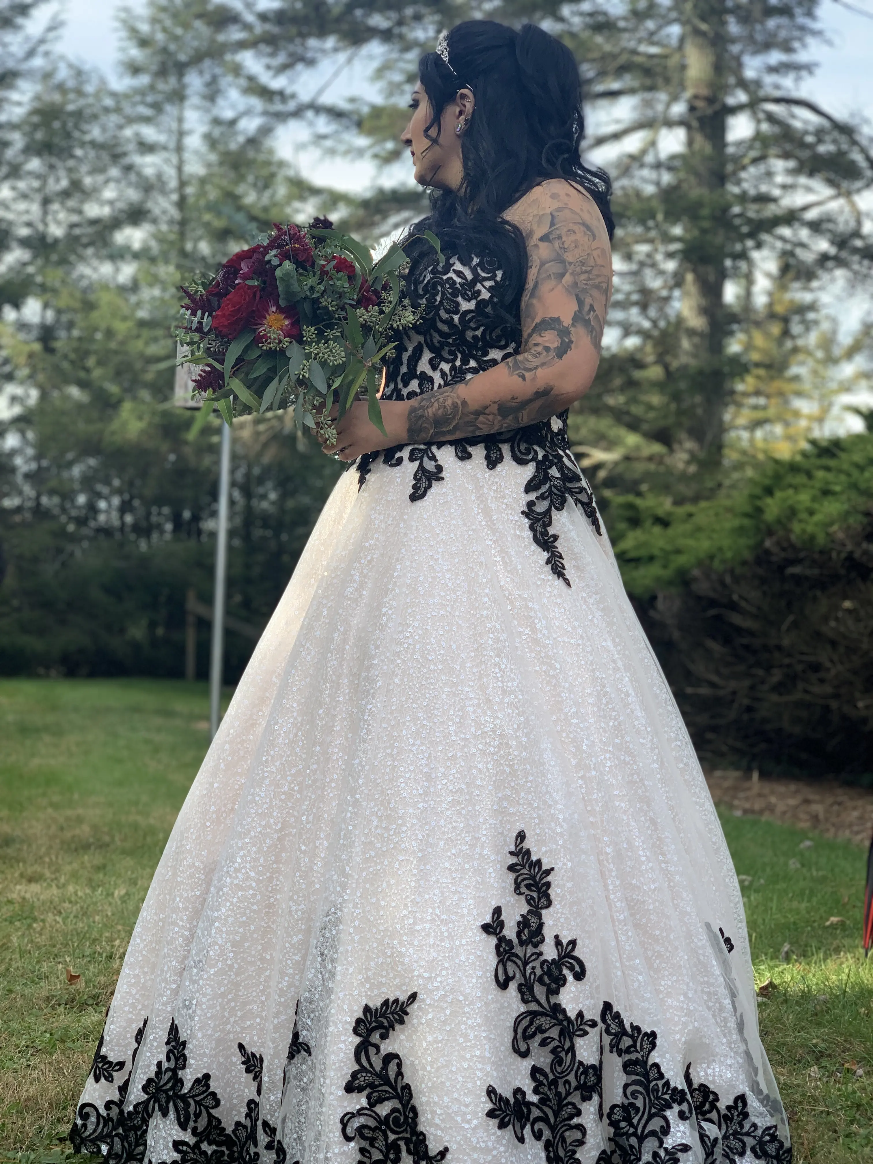 Bride wearing Black Lace Ballgown Wedding Dress called Tristyn by Maggie Sottero