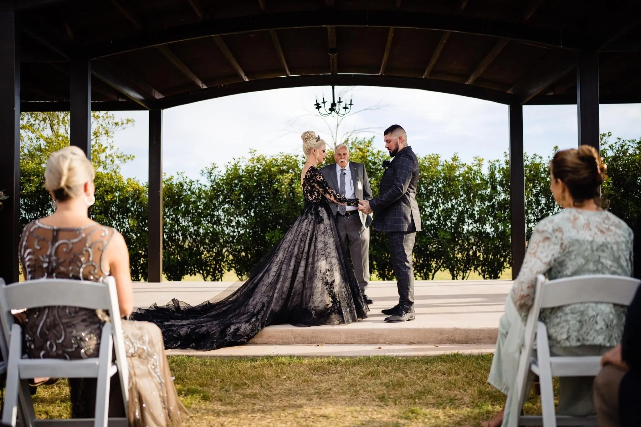 Bride Wearing Black Lace Wedding Dress Called Zander By Sottero And Midgley With Groom At The Ceremony