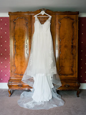 Real Bride's  A-Line Wedding Gown with Lace Motifs Over Tulle and Beaded Lace Bodice Embellished with Swarovski Crystals Called Priscilla by Rebecca Ingram