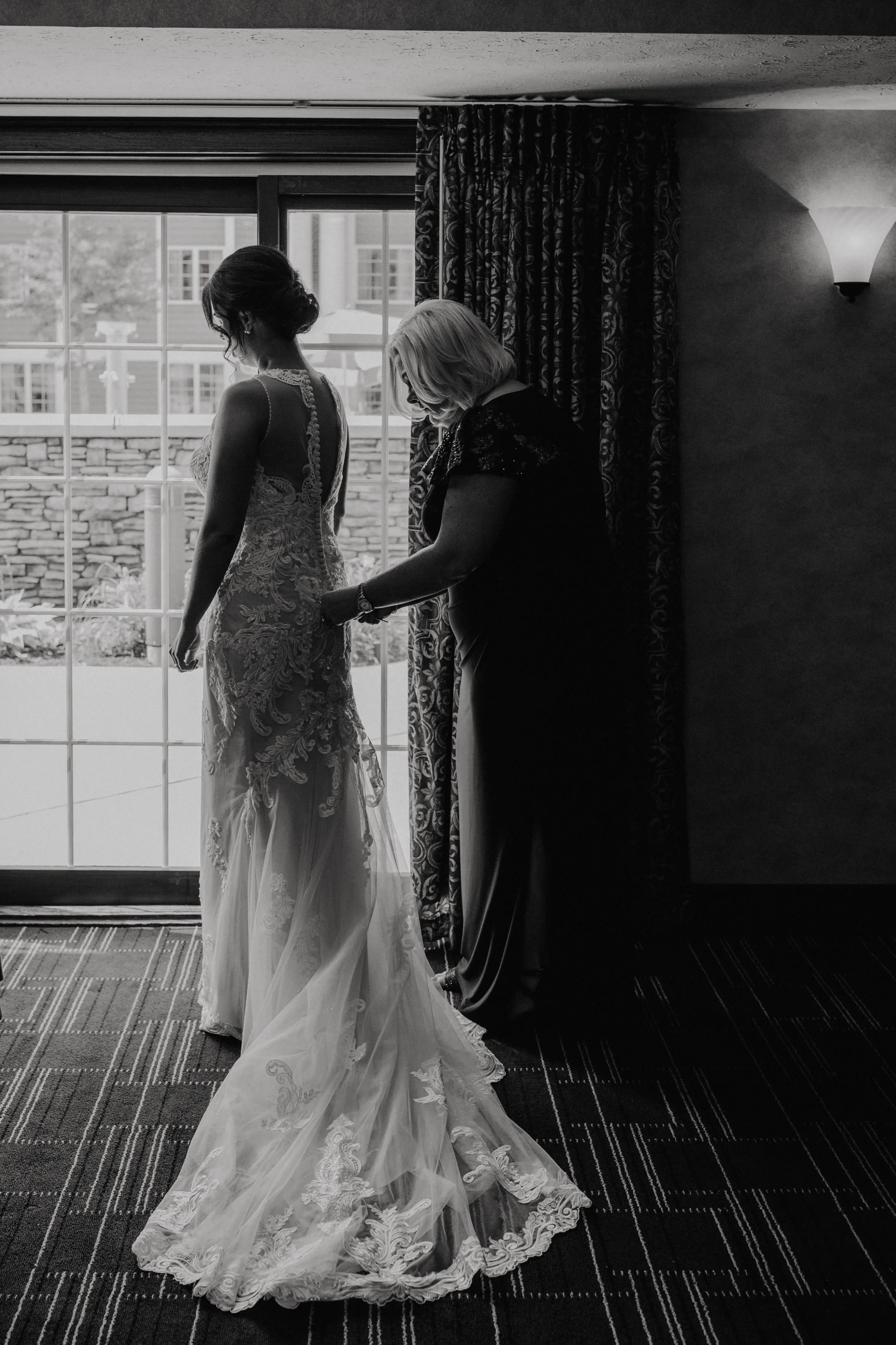 Bride wearing budget friendly fit and flare wedding dress