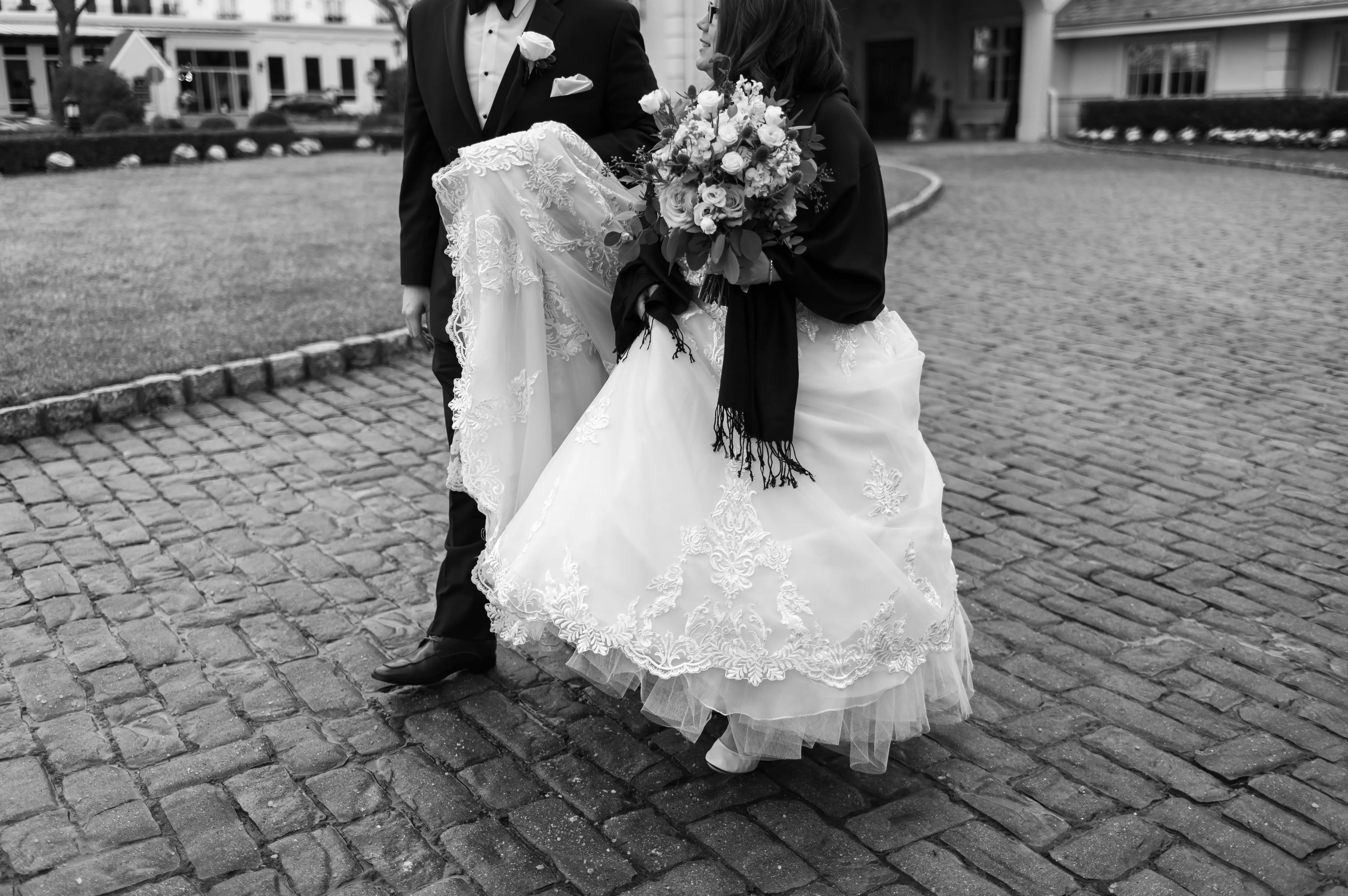 Bride in V neck ballgown called Trinity Lynette by Maggie Sottero with groom