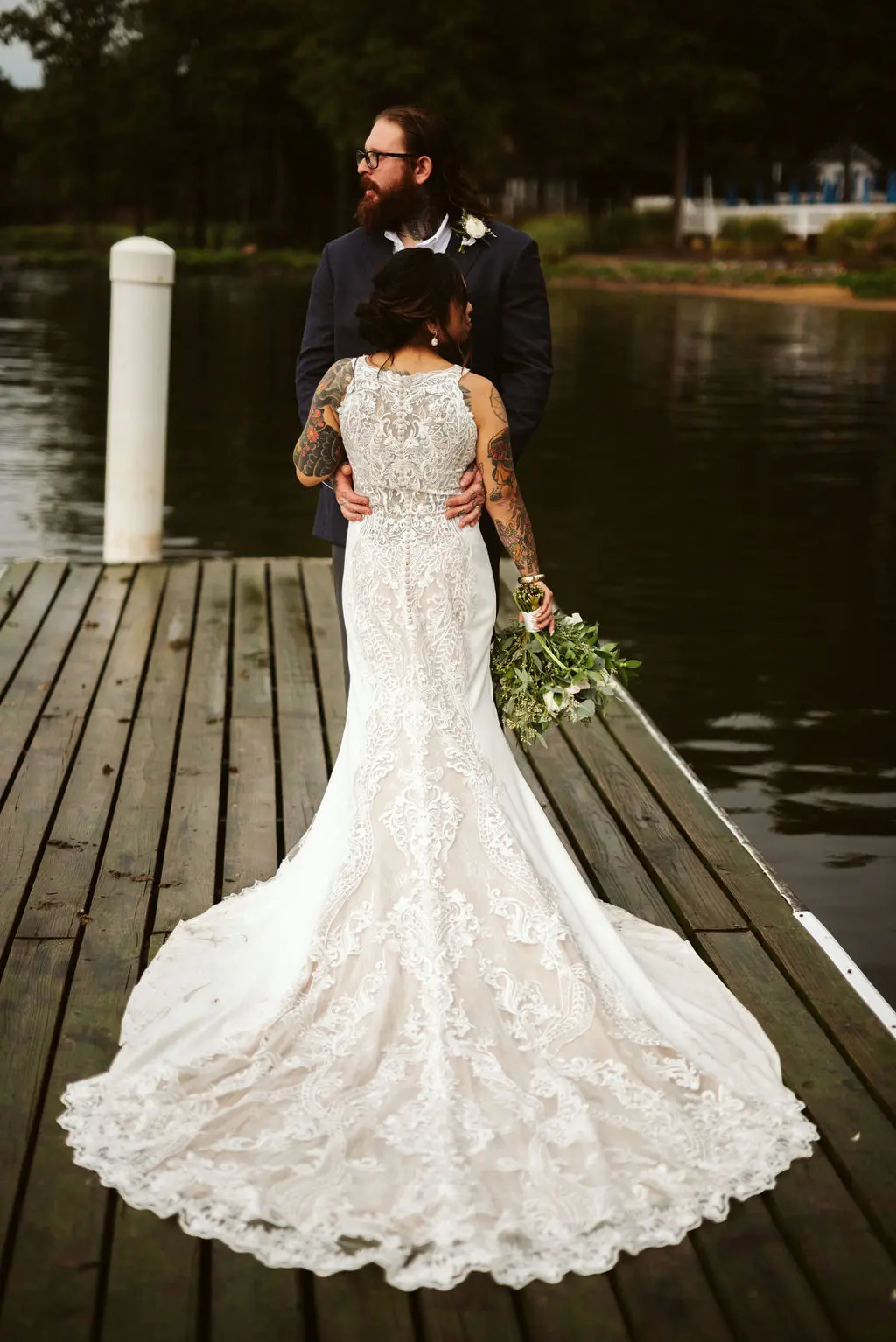 Bride Wearing Halter Lace Wedding Dress Called Kevyn By Sottero And Midgley With Groom On A Dock