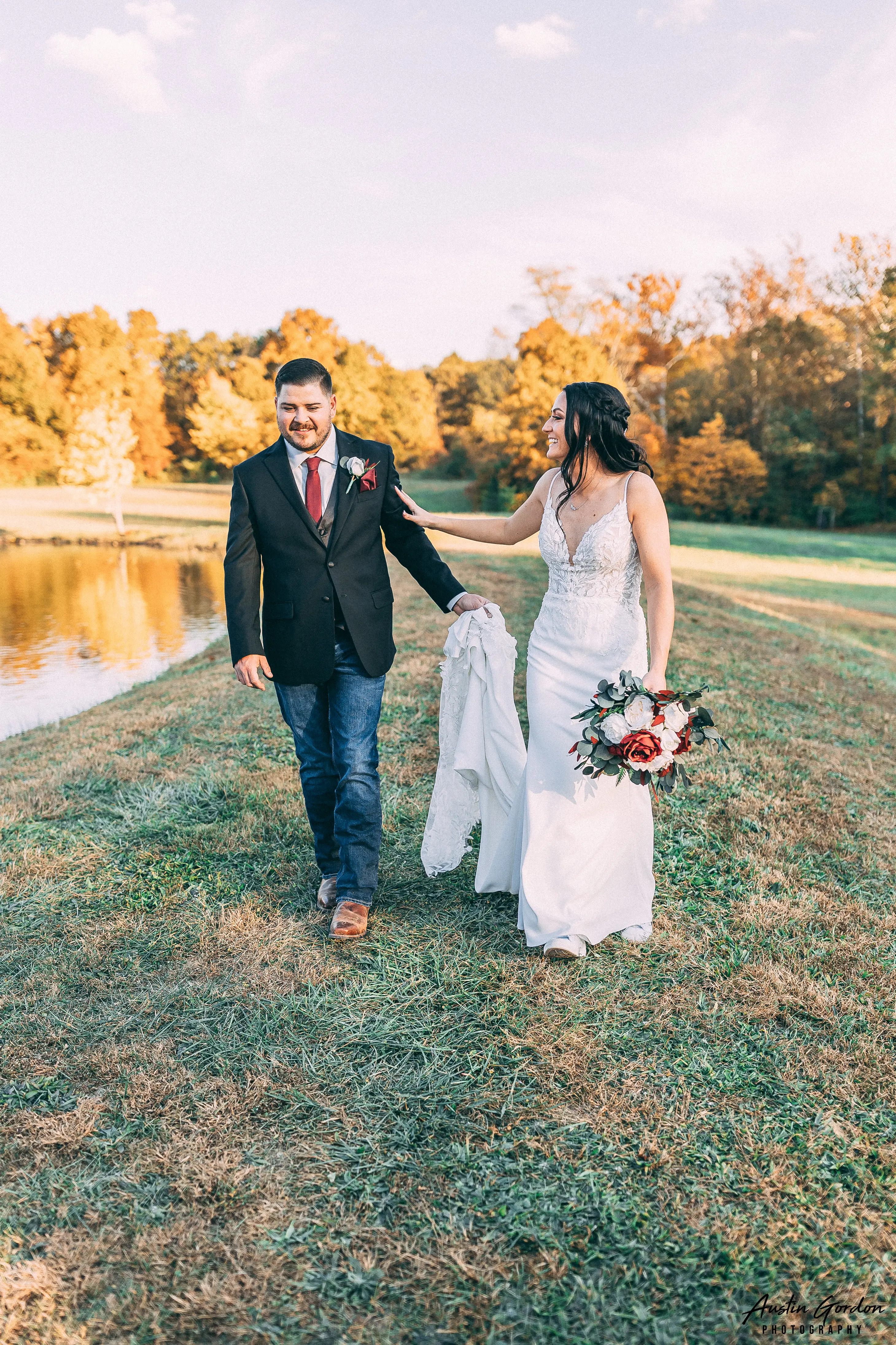 Bride Wearing Crepe Sheath Wedding Dress Called Alda By Rebecca Ingram Walking With Groom