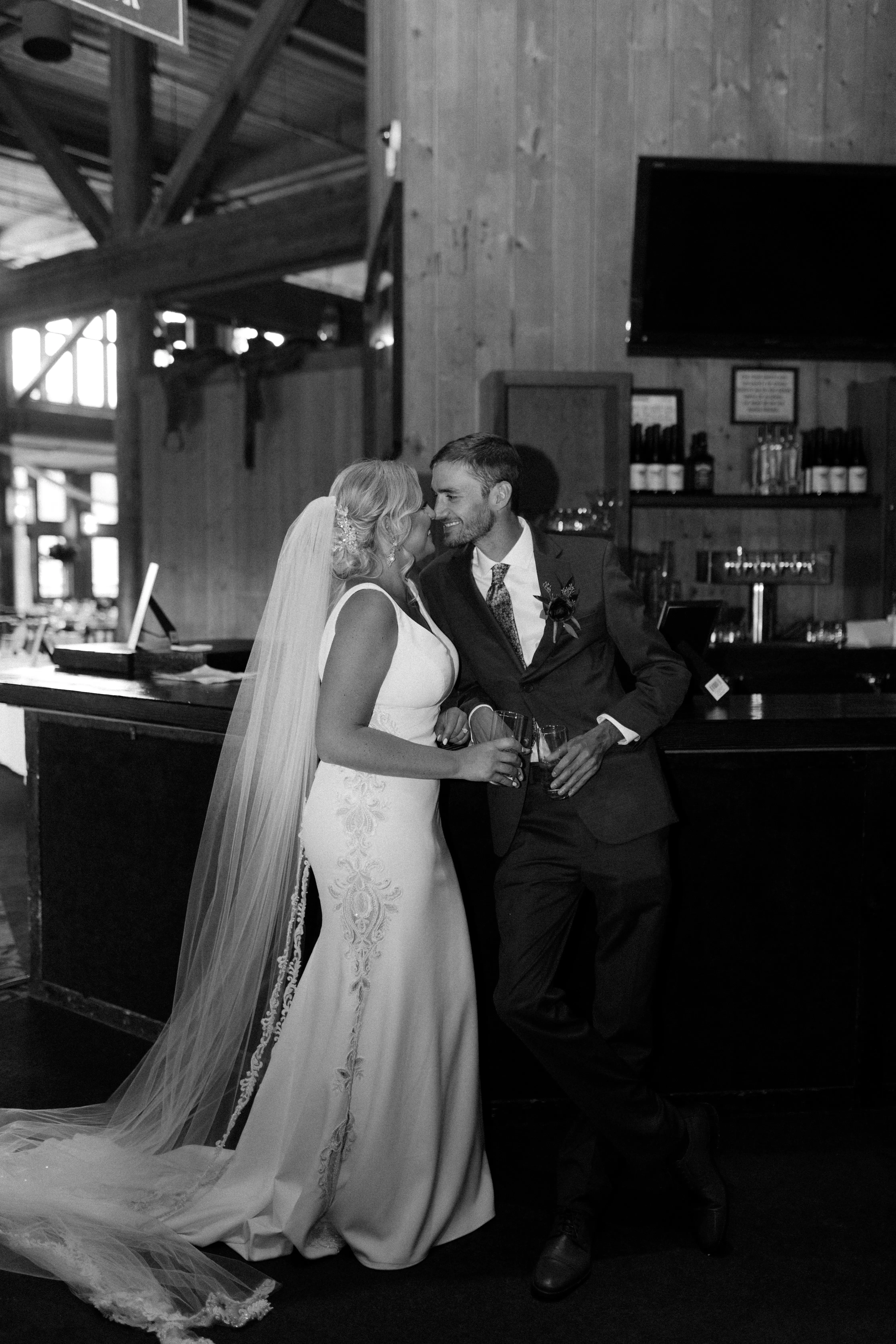 Bride With Groom Wearing Simple Vintage V-back Dress Abbott Dawn By Sottero and Midgley