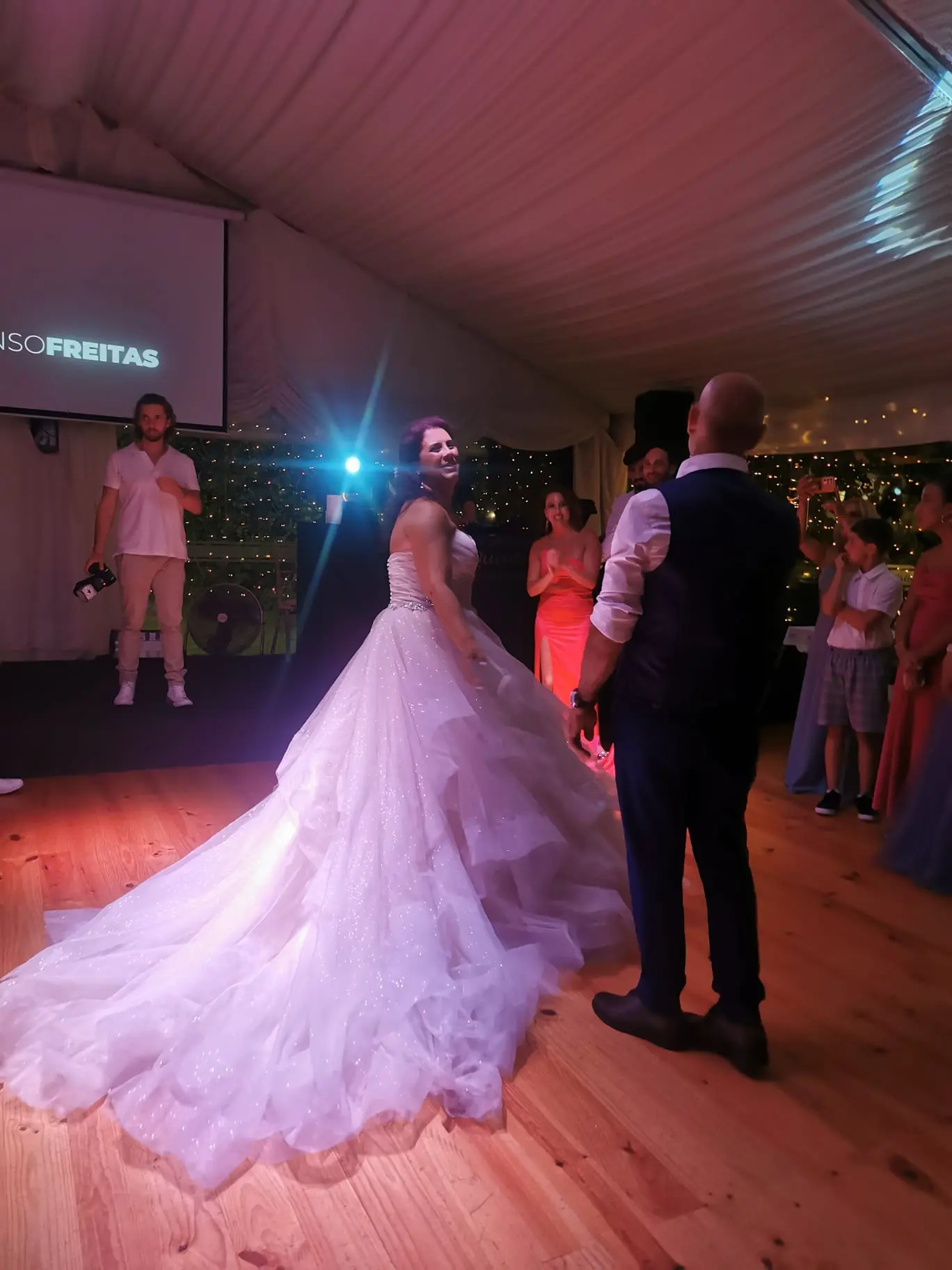 Bride Wearing Sparkly Ballgown Wedding Dress Called Yasmin By Maggie Sottero Dancing At The Reception