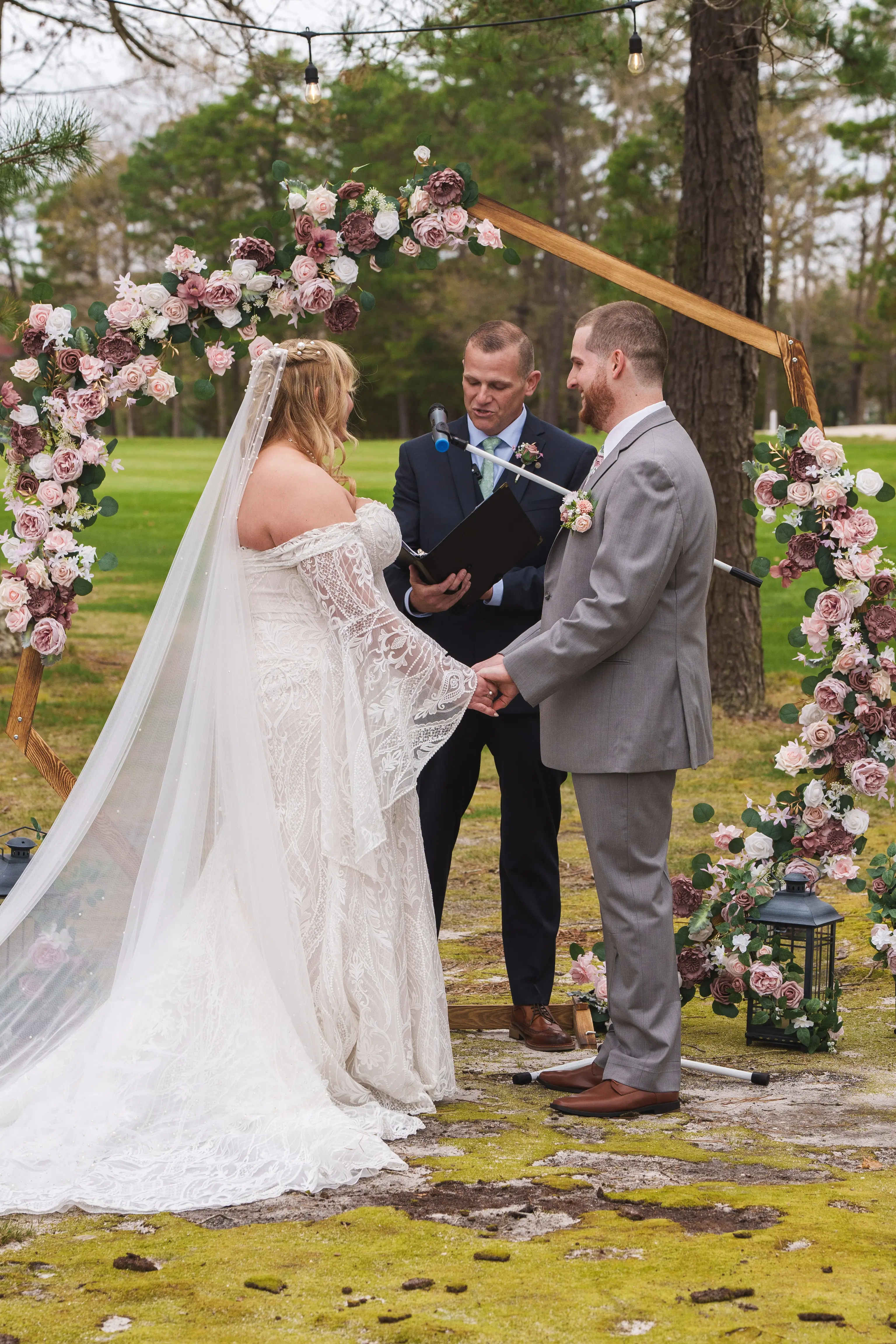 Bride wearing Bronson by Sottero and Midgley being married to her husband