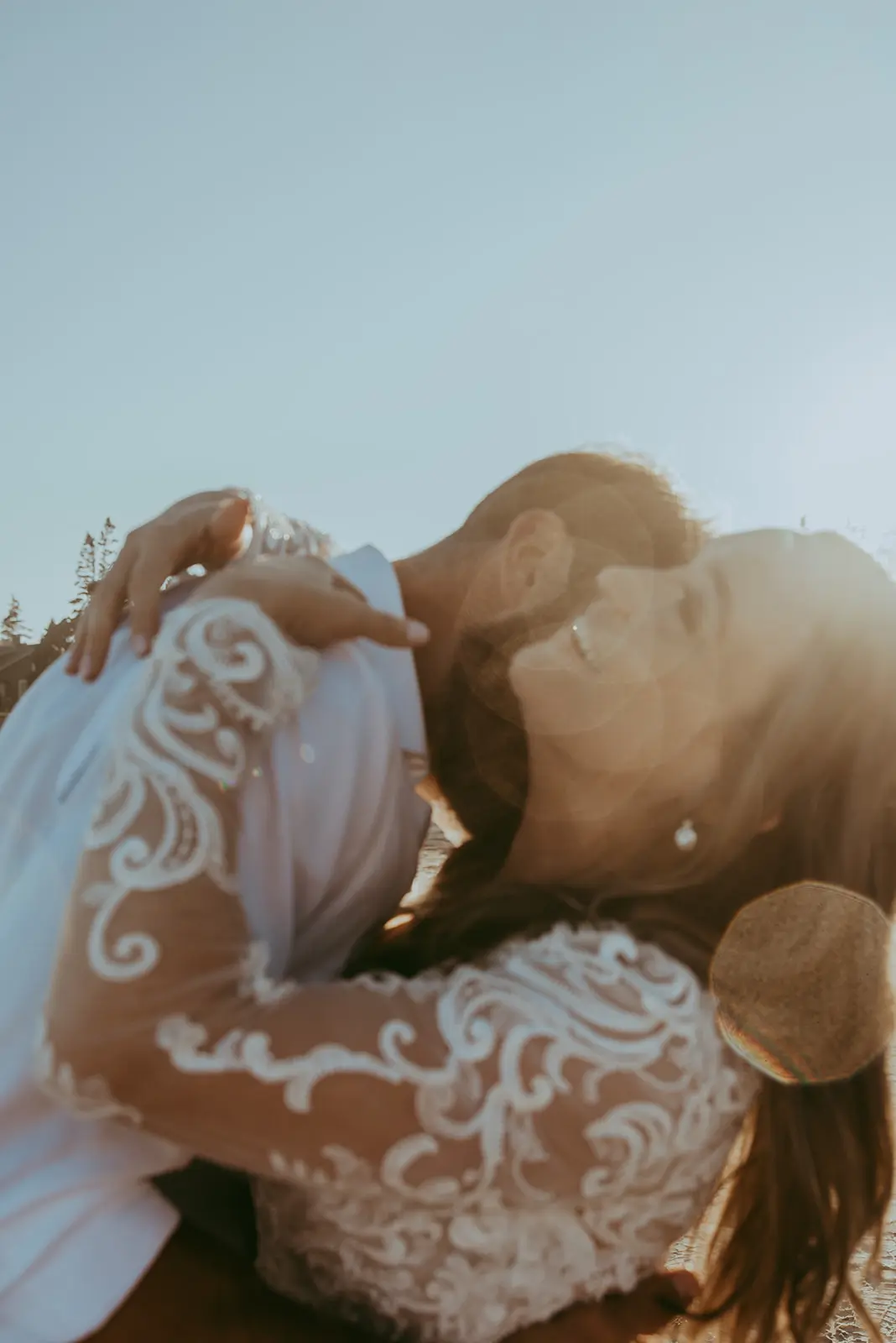 Groom With Bride Wearing Illusion Lace Long Sleeved Wedding Dress Lorraine Dawn By Rebecca Ingram