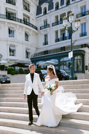 Groom With Bride Wearing Simple Off The Shoulder Fit And Flare Wedding Dress Josie By Rebecca Ingram