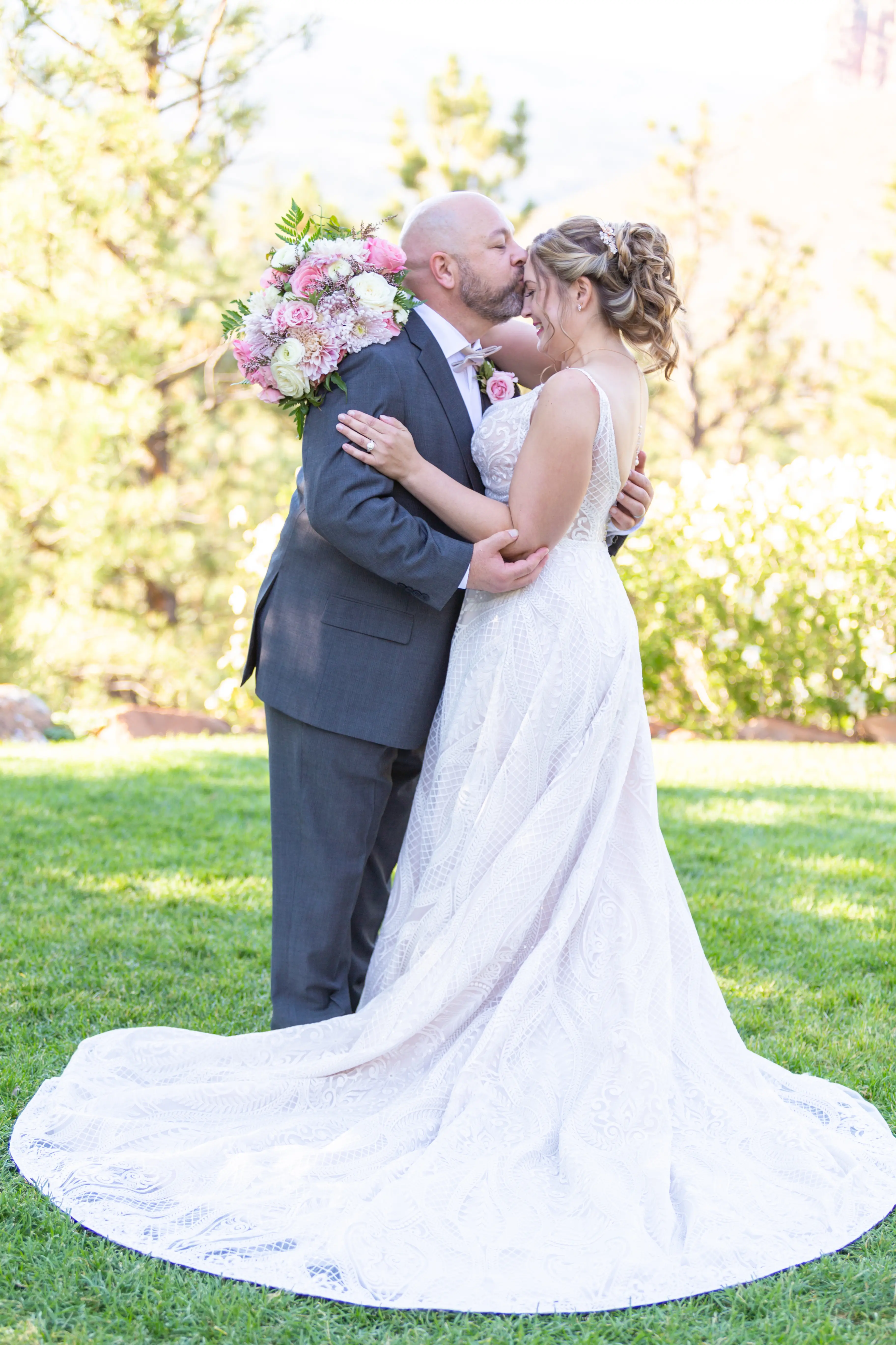Groom With Bride Wearing Boho Princess A-Line Wedding Dress Roxanne By Sottero And Midgley