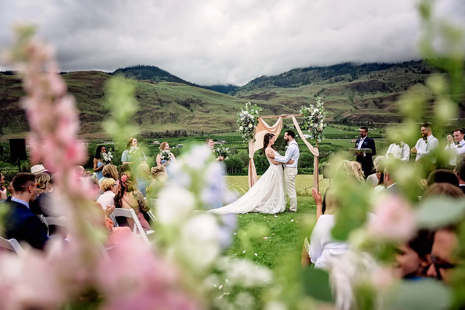 Bride Wearing Romantic Key Hole Back A-Line Wedding Dress Called Marlow By Maggie Sottero With Groom In Mountain Ceremony