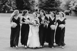 Bride Wearing Strapless Mermaid Wedding Dress With Oversized Lace Hattie By Rebecca Ingram