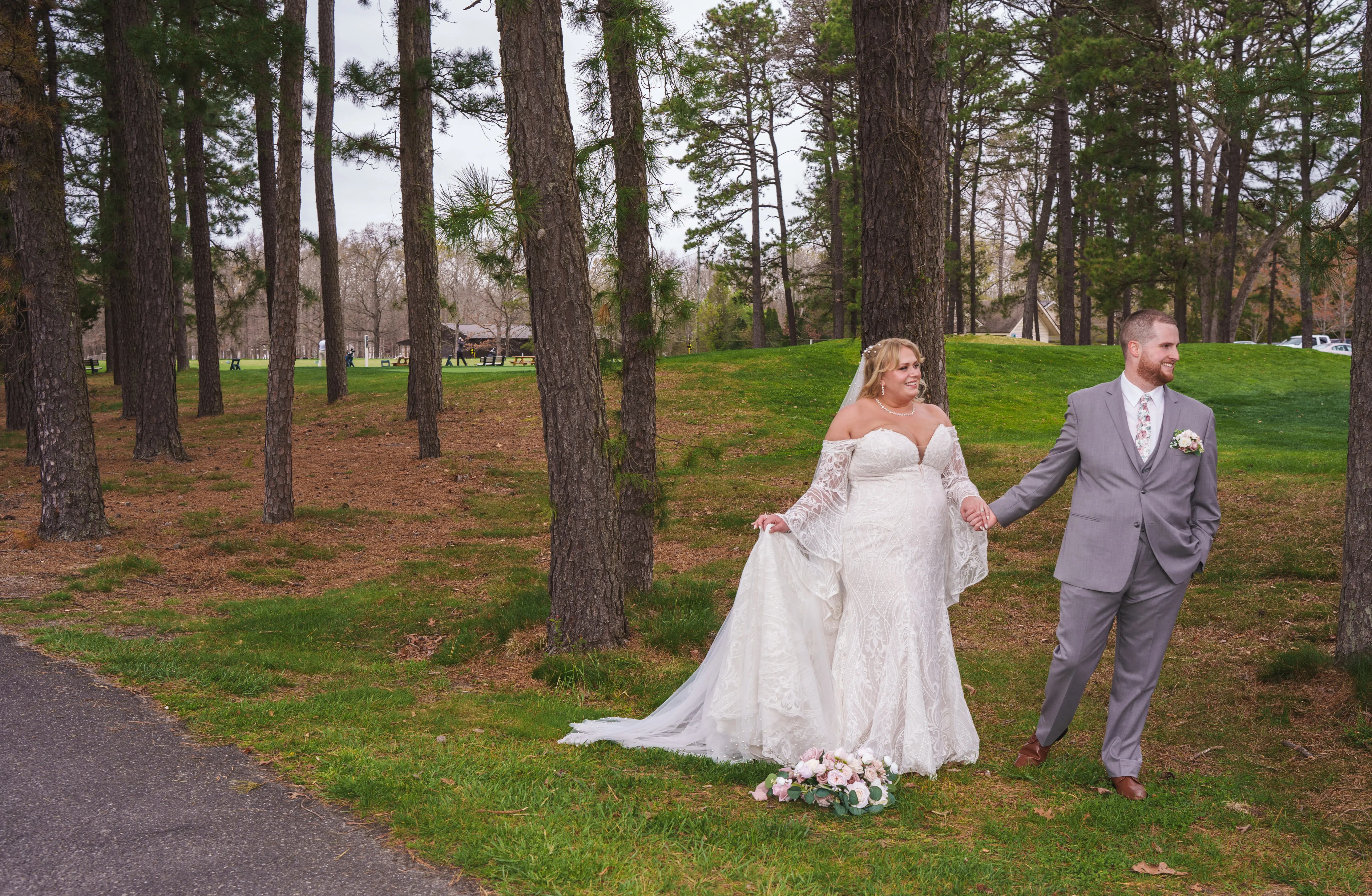 Bride wearing Bronson by Sottero and Midgley walking with her husband