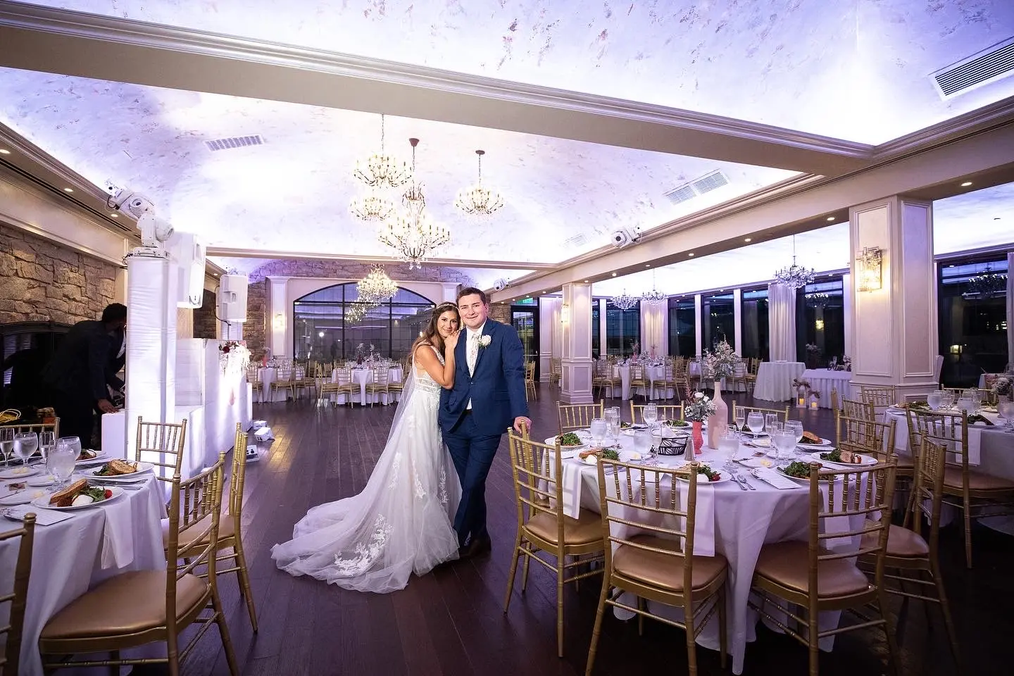 Bride wearing Lace A-line Wedding Dress called Raelynn by Rebecca Ingram with her groom