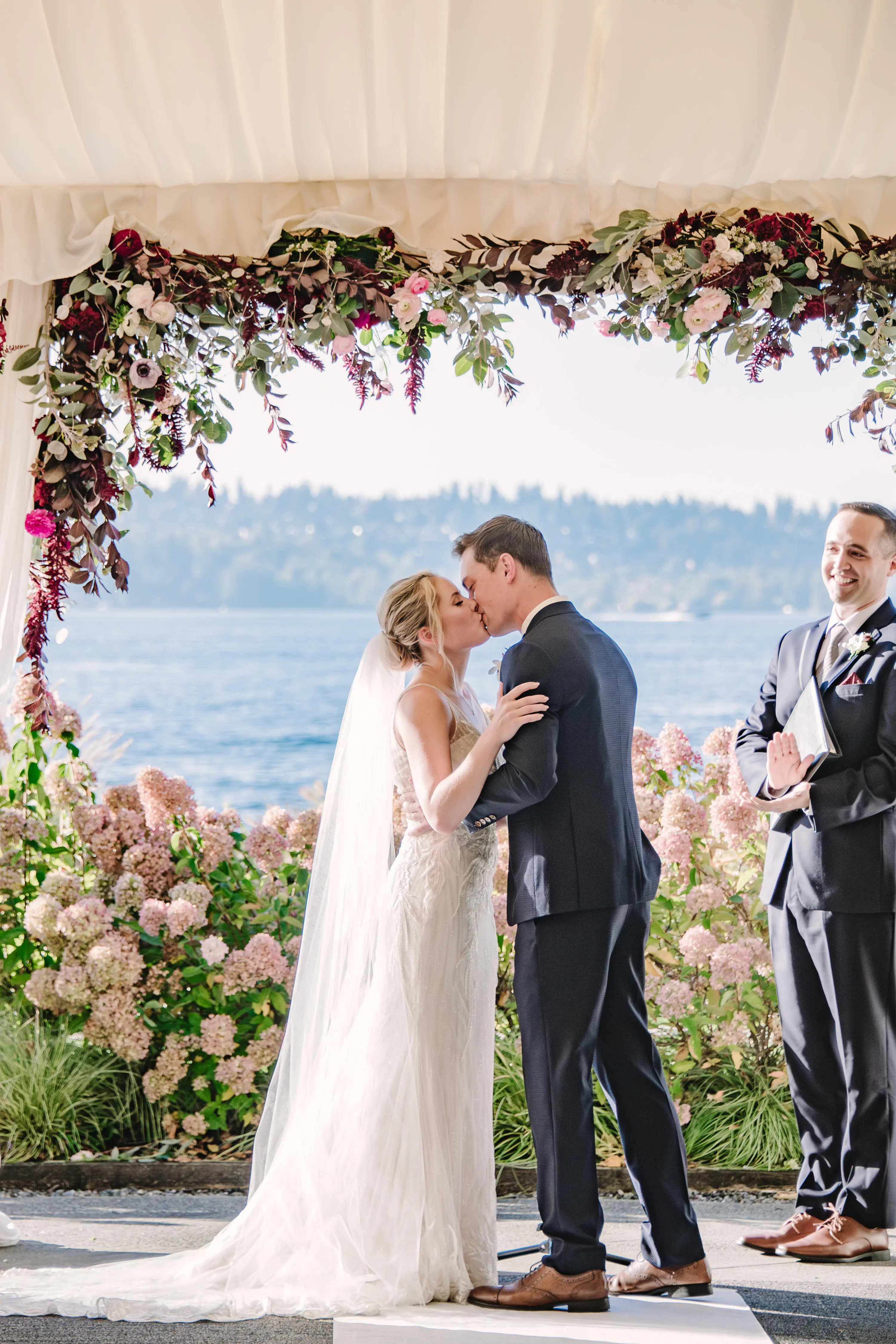 Bride Wearing Beaded Wedding Dress Called Luella By Sottero And Midgley Kissing Groom