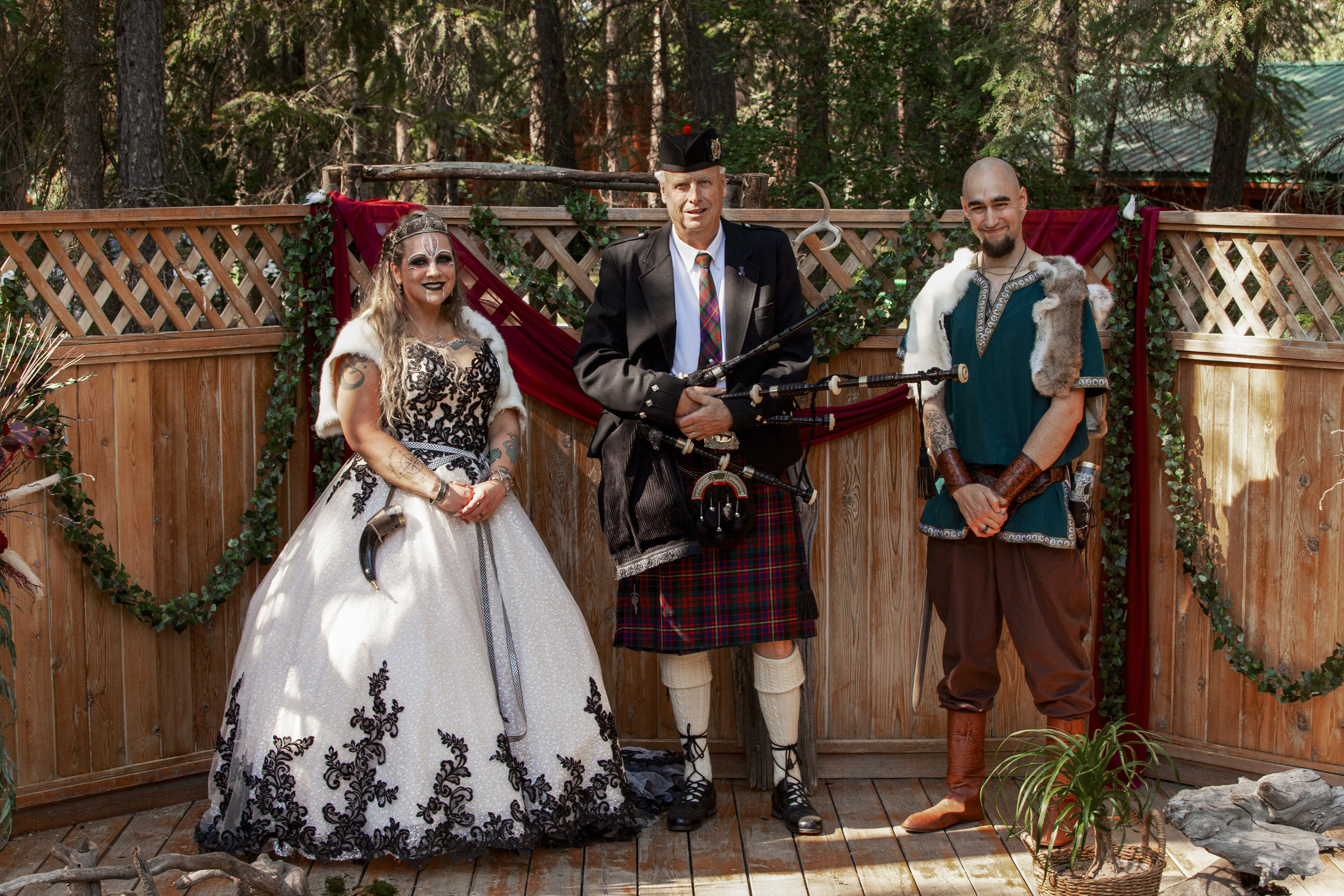 Bride wearing Trystin wedding dress by Maggie Sottero with her husband and another man