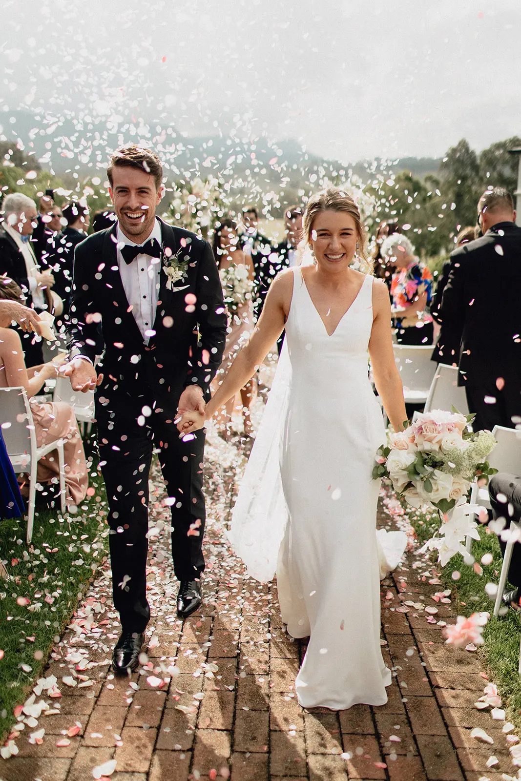 Groom With Bride Wearing Minimalist Crepe Fit-And-Flare Wedding Dress Fernanda By Maggie Sottero