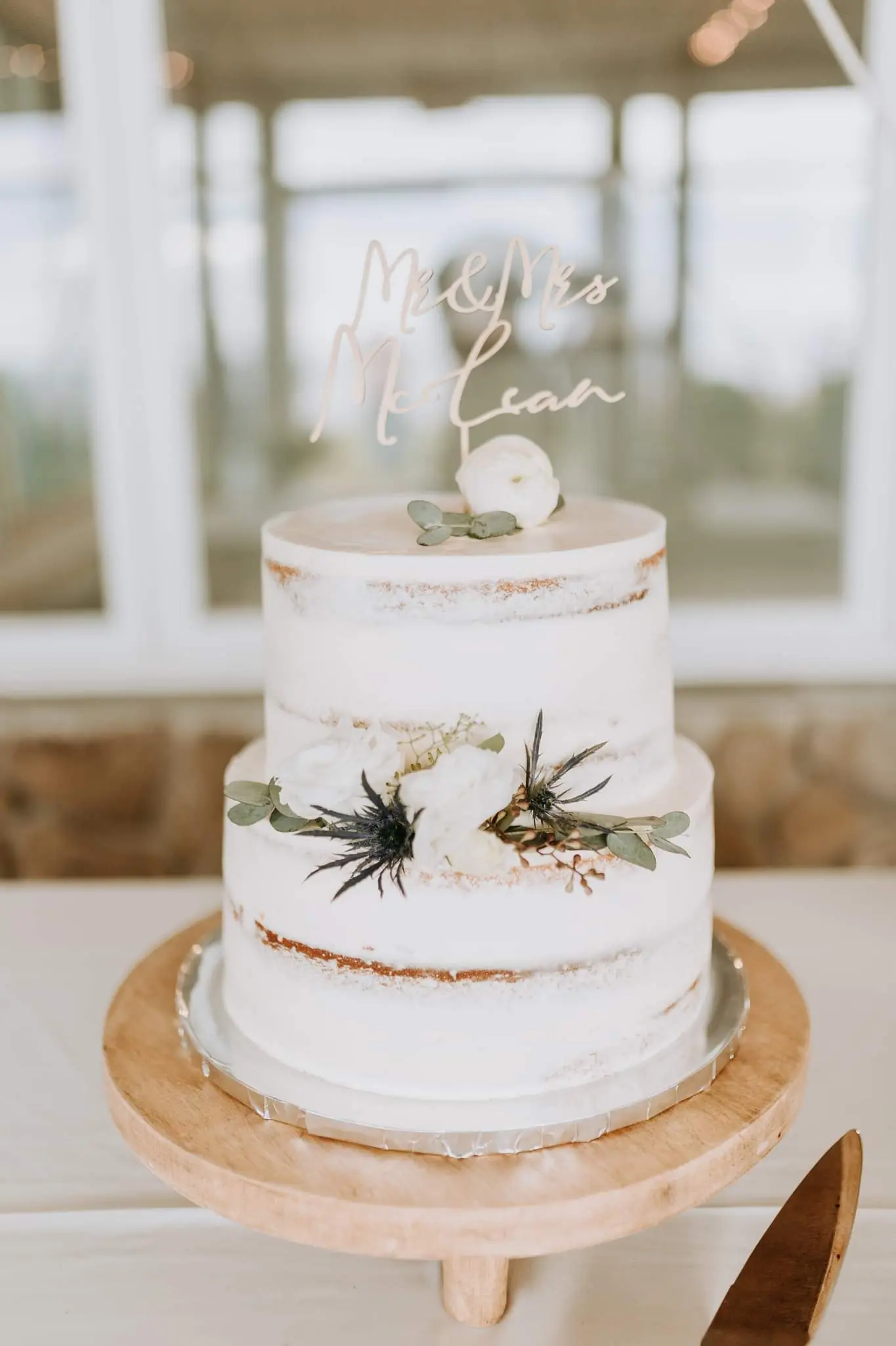 Rustic Wedding Cake with White and Sage Florals