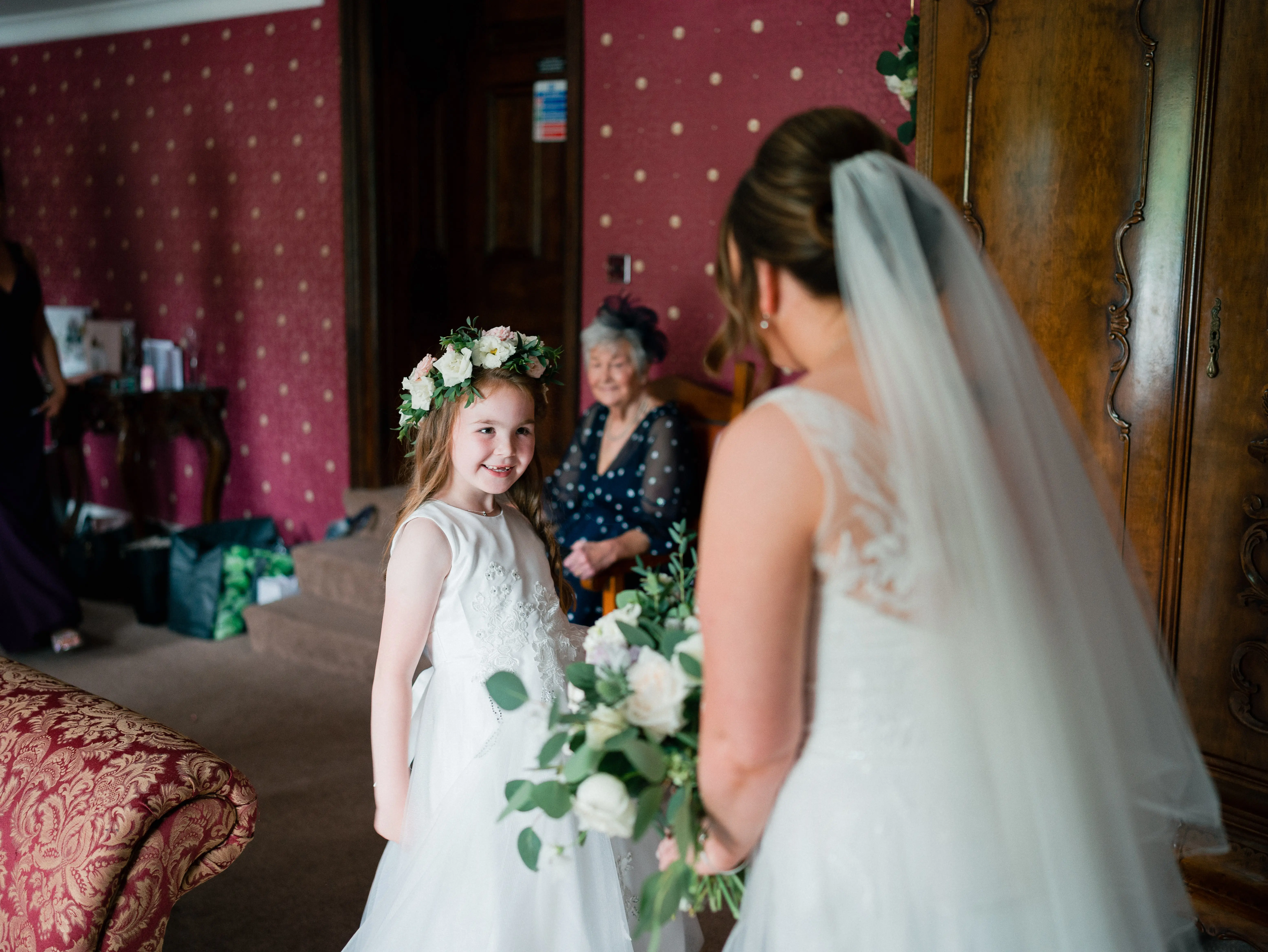 Real Bride in A-Line Wedding Gown with Lace Motifs Over Tulle and Beaded Lace Bodice Embellished with Swarovski Crystals Called Priscilla by Rebecca Ingram