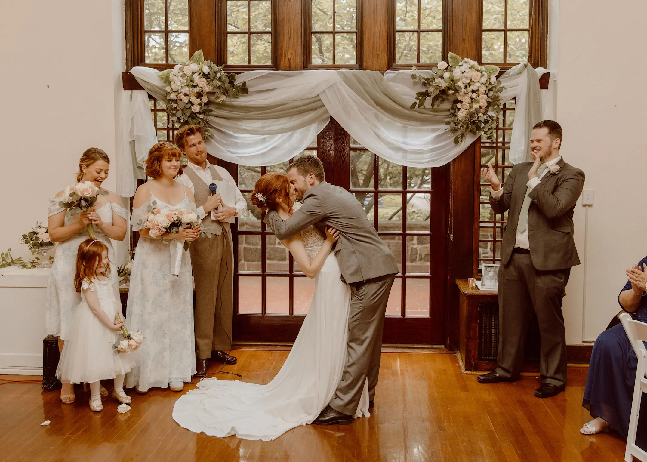Bride Wearing Boho Sheath Wedding Dress Called Lorraine By Rebecca Ingram Kissing The Groom