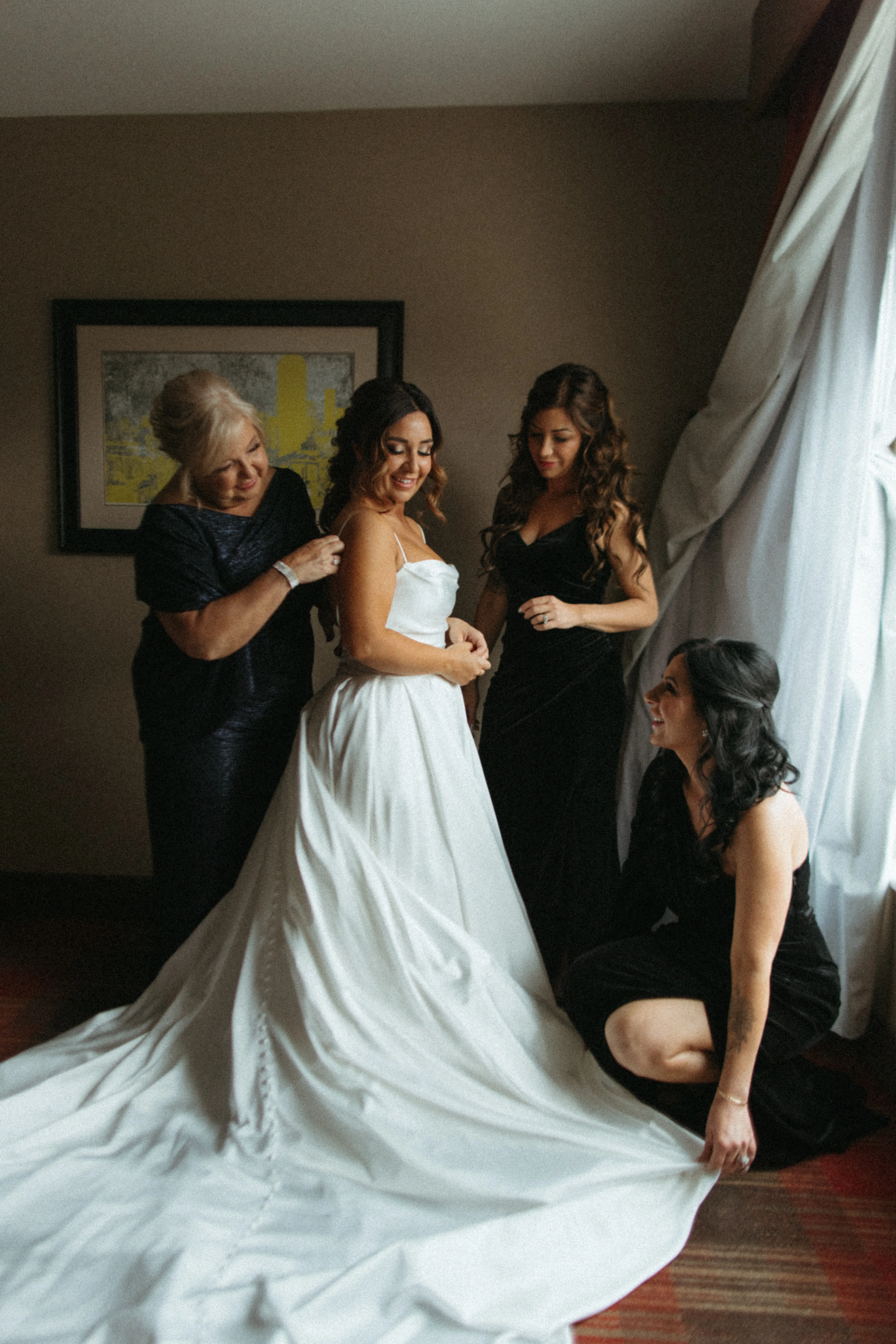 Bride In Simple Satin Wedding Dress Called Scarlet By Maggie Sottero With Mother Of The Bride And Bridesmaids