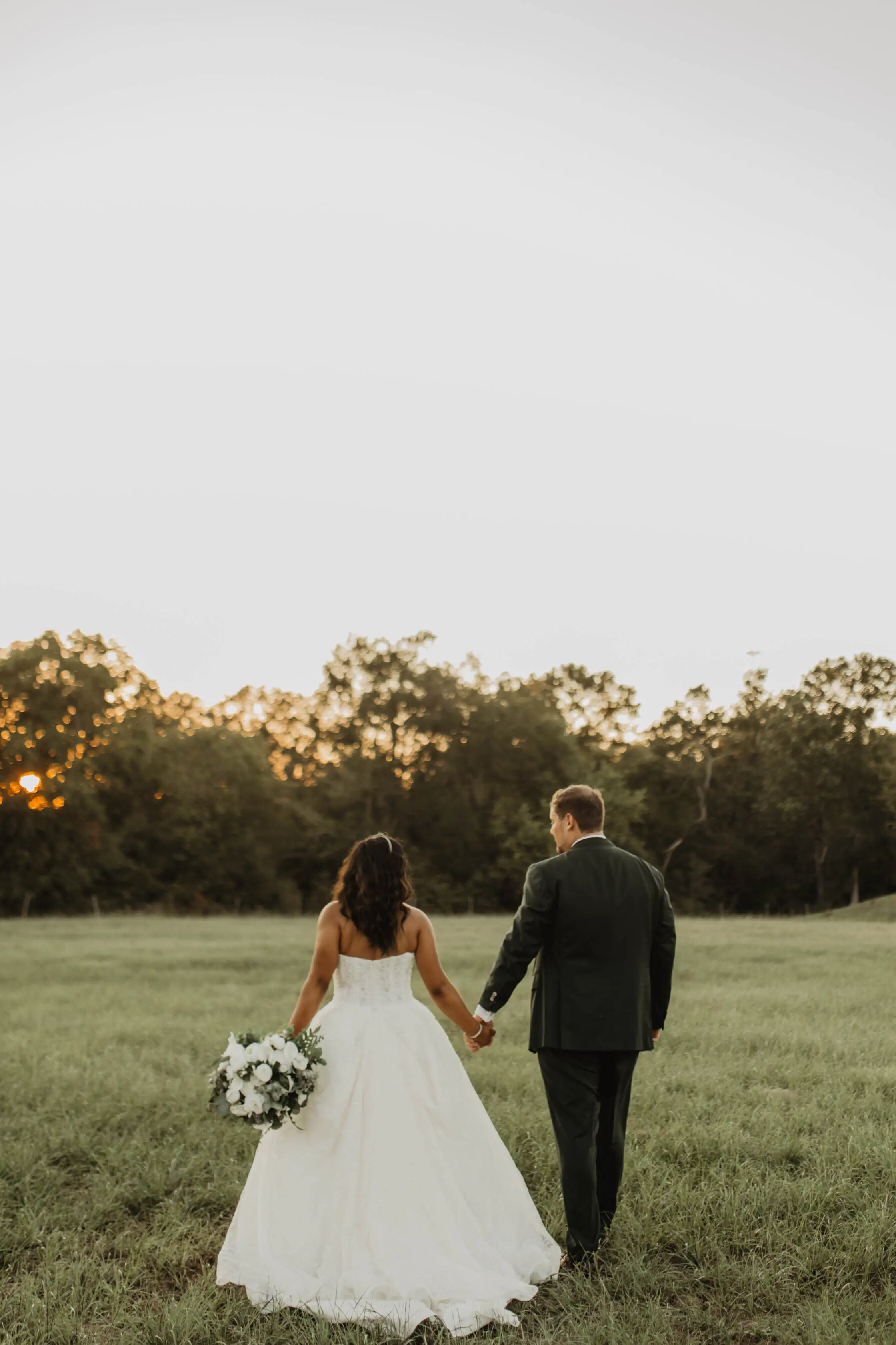 Bride Wearing Sparkly Ballgown Wedding Dress Called Zartasha By Sottero and Midgley With Groom