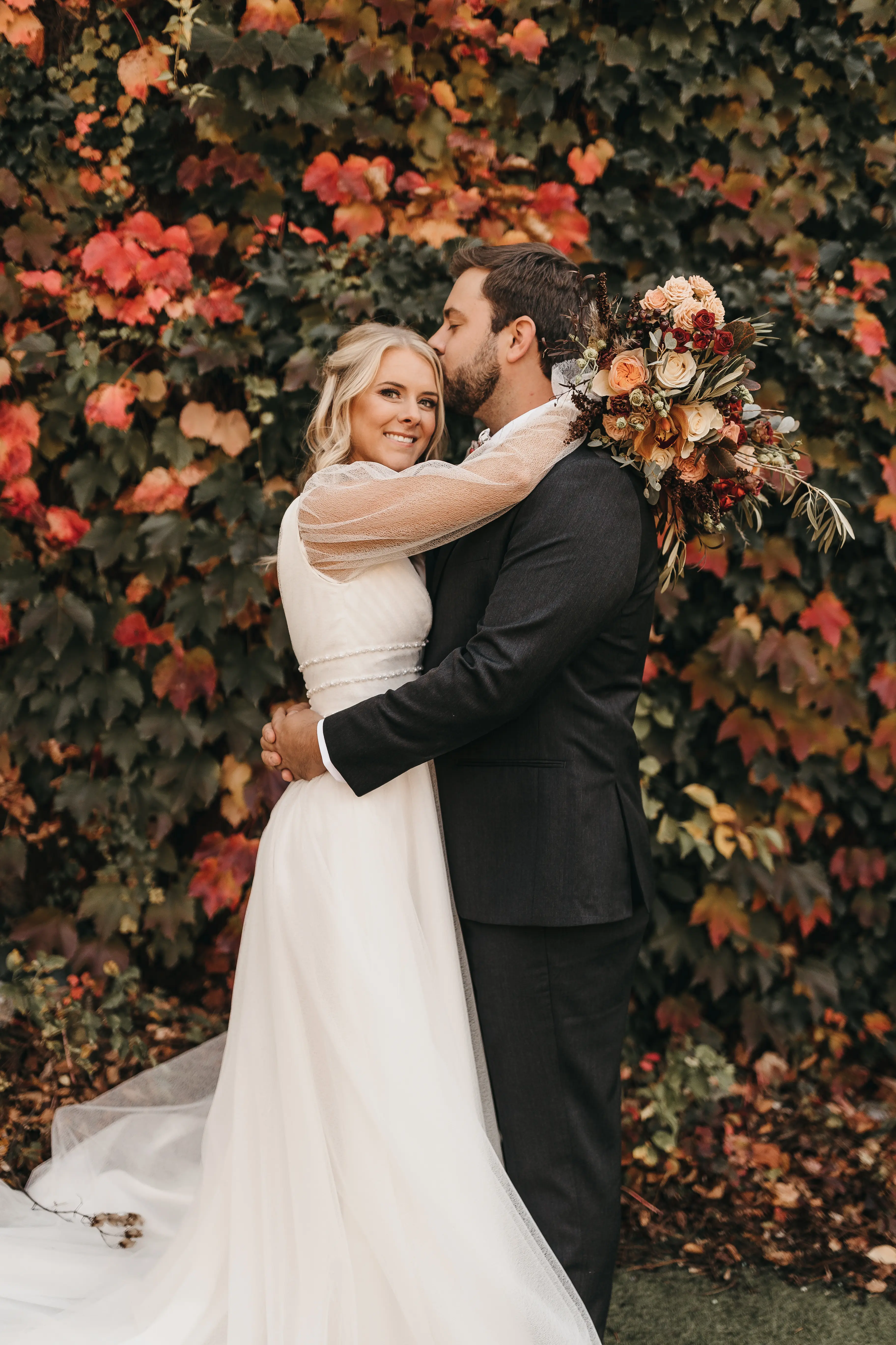 Bride with groom in long bishop sleeve, boho wedding dress