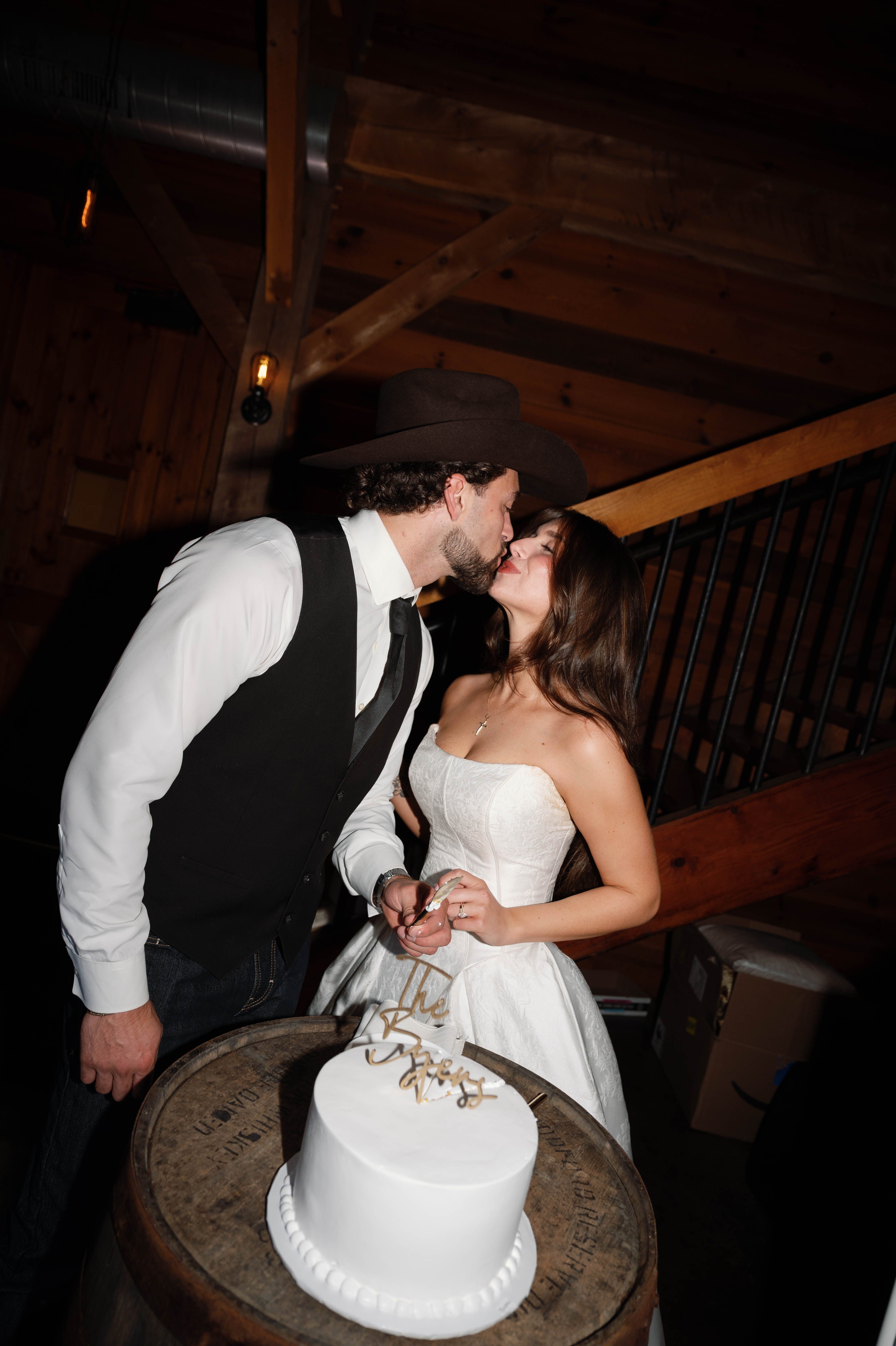 Bride Wearing Jacquard Ballgown Wedding Dress Called Fortune Marie By Maggie Sottero Next To Cake With Groom