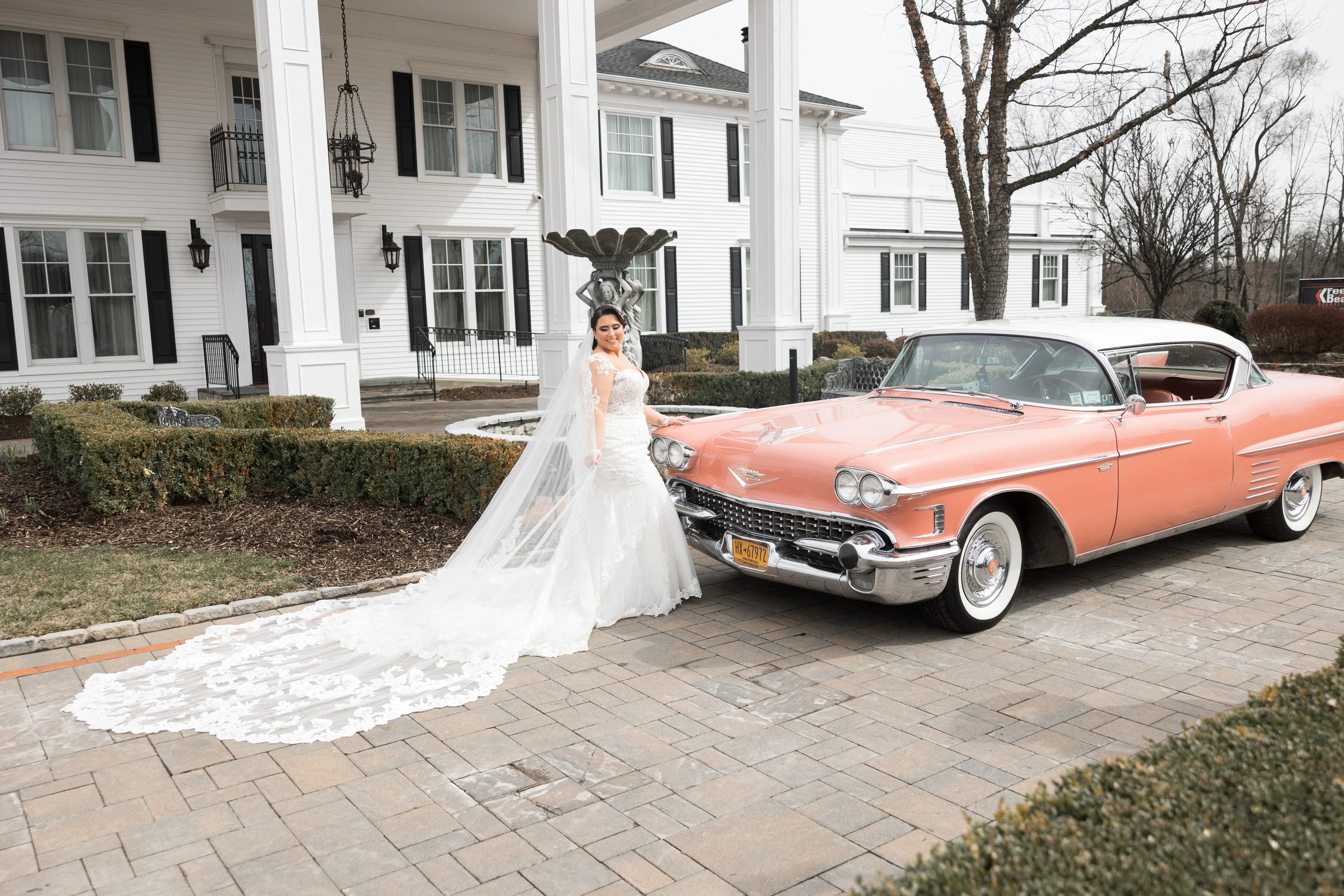 Bride Wearing Sexy Lace Long Sleeve Wedding Dress Called Fiona By Maggie Sottero Next To Vintage Car