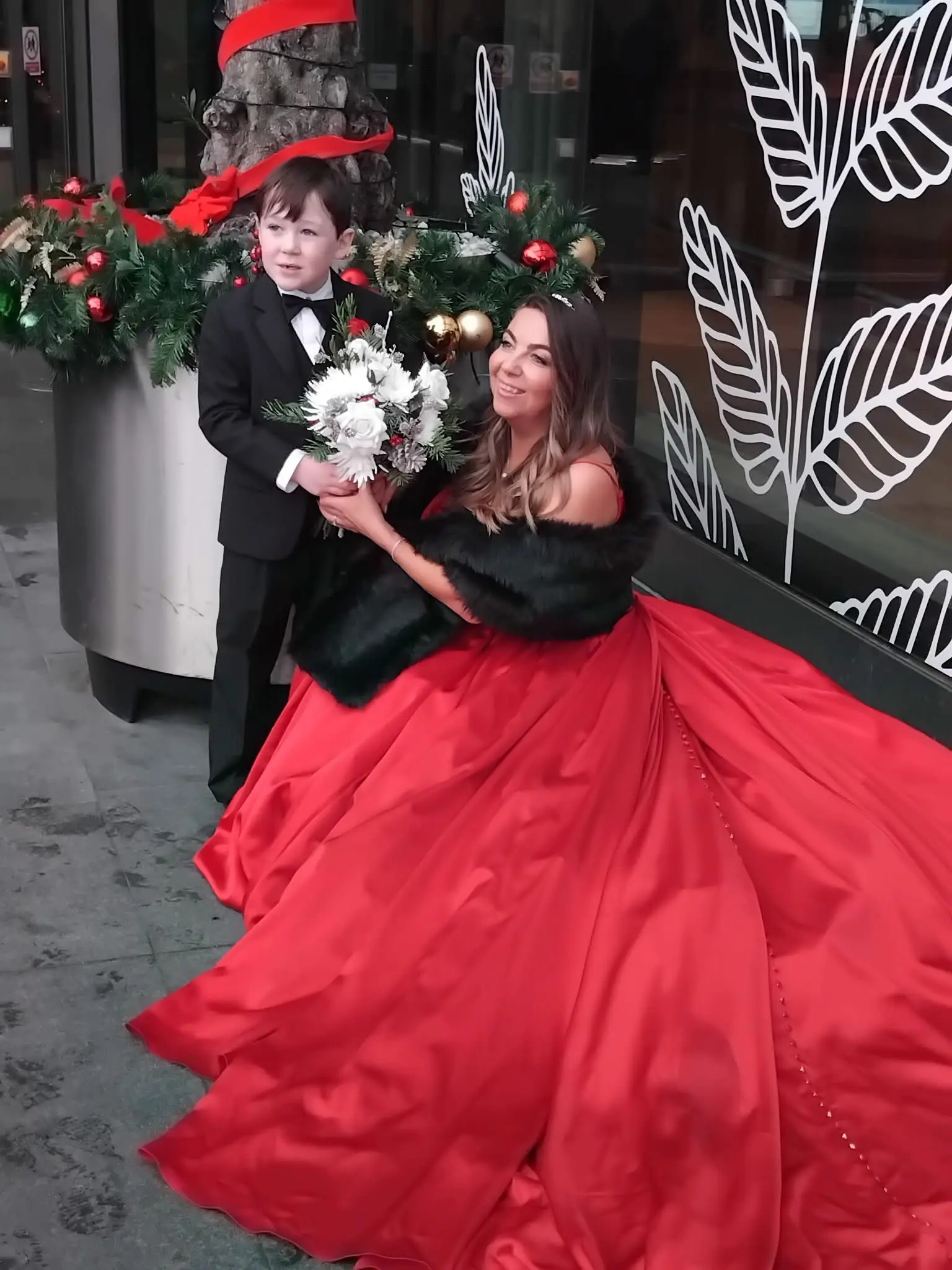 Bride Wearing Red Aline Wedding Dress Called Scarlet By Maggie Sottero With Her Son