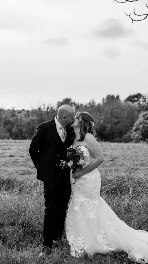 Bride In Lace Mermaid Wedding Dress Called Hattie By Rebecca Ingram With Groom