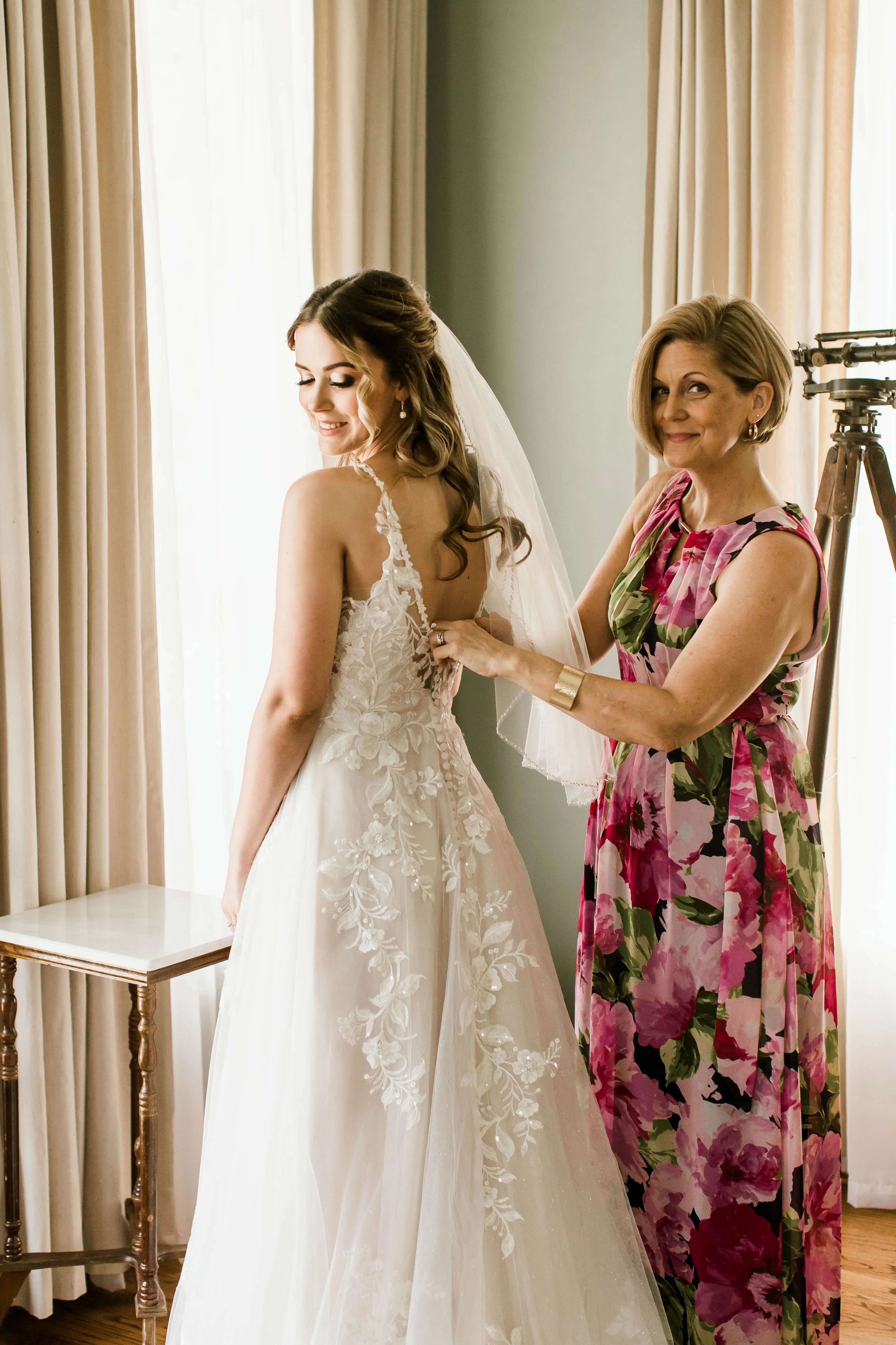 Bride wearing affordable floral ballgown wedding dress.