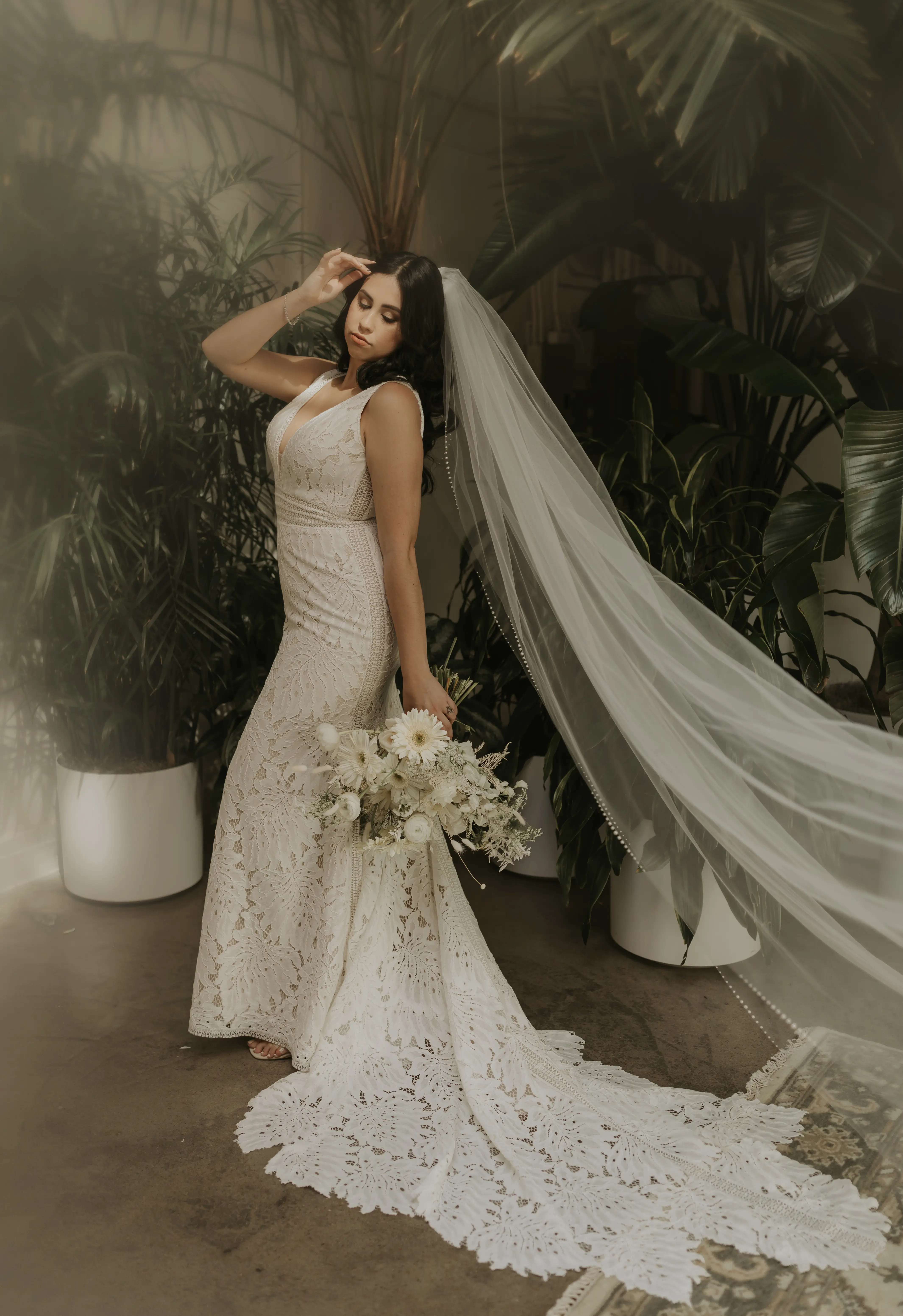 Bride in lacy wedding dress called Burke.