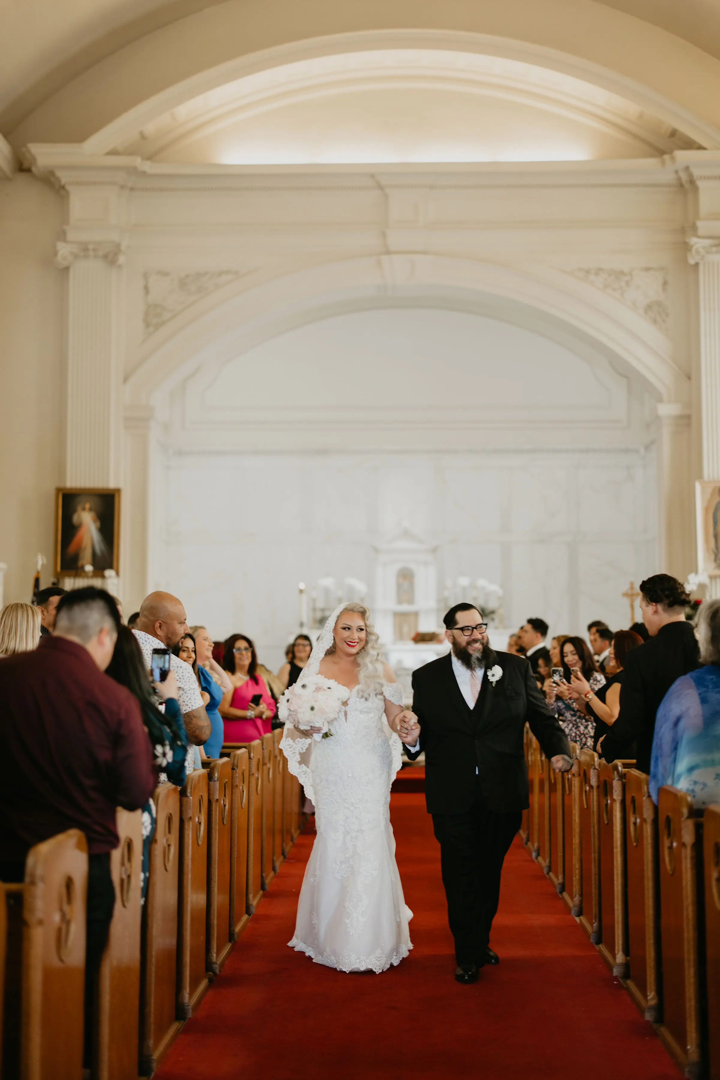 Bride Wearing Sexy Lace Wedding Dress Called Fiona By Maggie Sottero Walking With Groom After The Ceremony