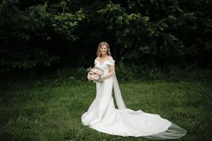Bride In Satin Wedding Dress Called Josie By Rebecca Ingram