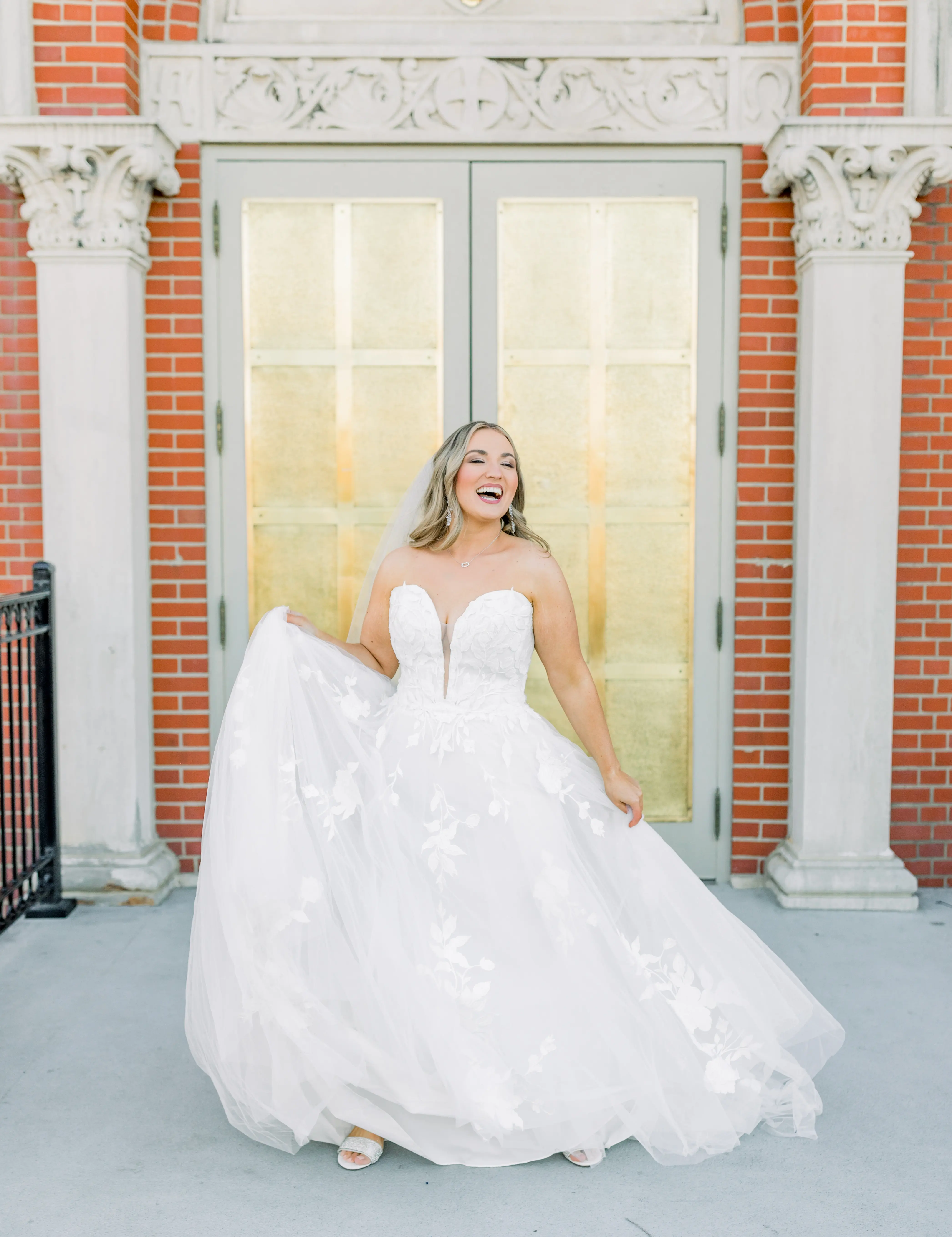 Bride wearing Hattie Lane Marie wedding dress by Rebecca Ingram