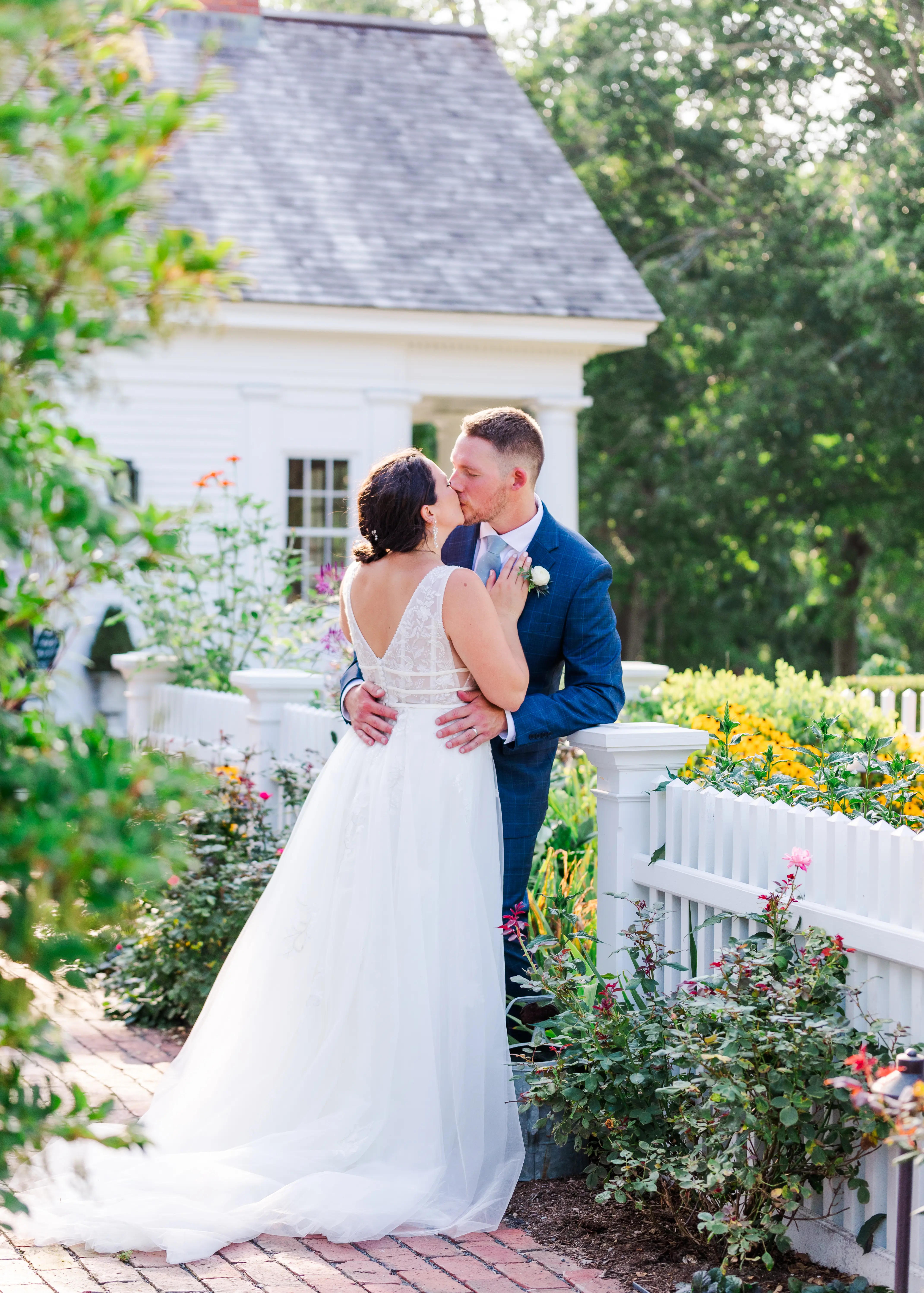 Groom With Bride Wearing Lace A-Line Wedding Dress Raelynn By Rebecca Ingram