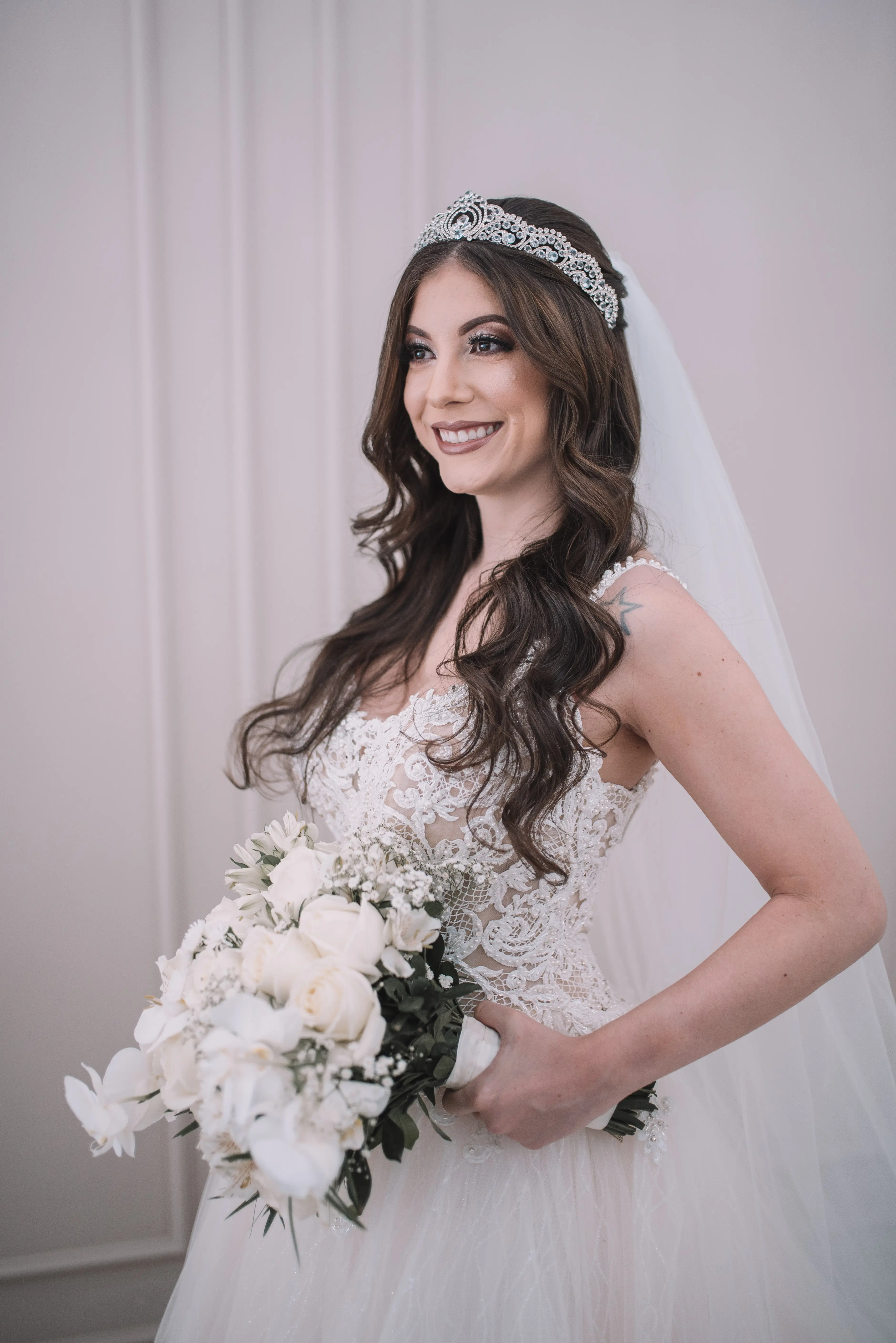 Bride in Flirty A-Line Wedding Gown with Beaded Lace Motifs over Textured Tulle and Precious Organza with Sheer Beaded Bodice Called Savannah by Maggie Sottero