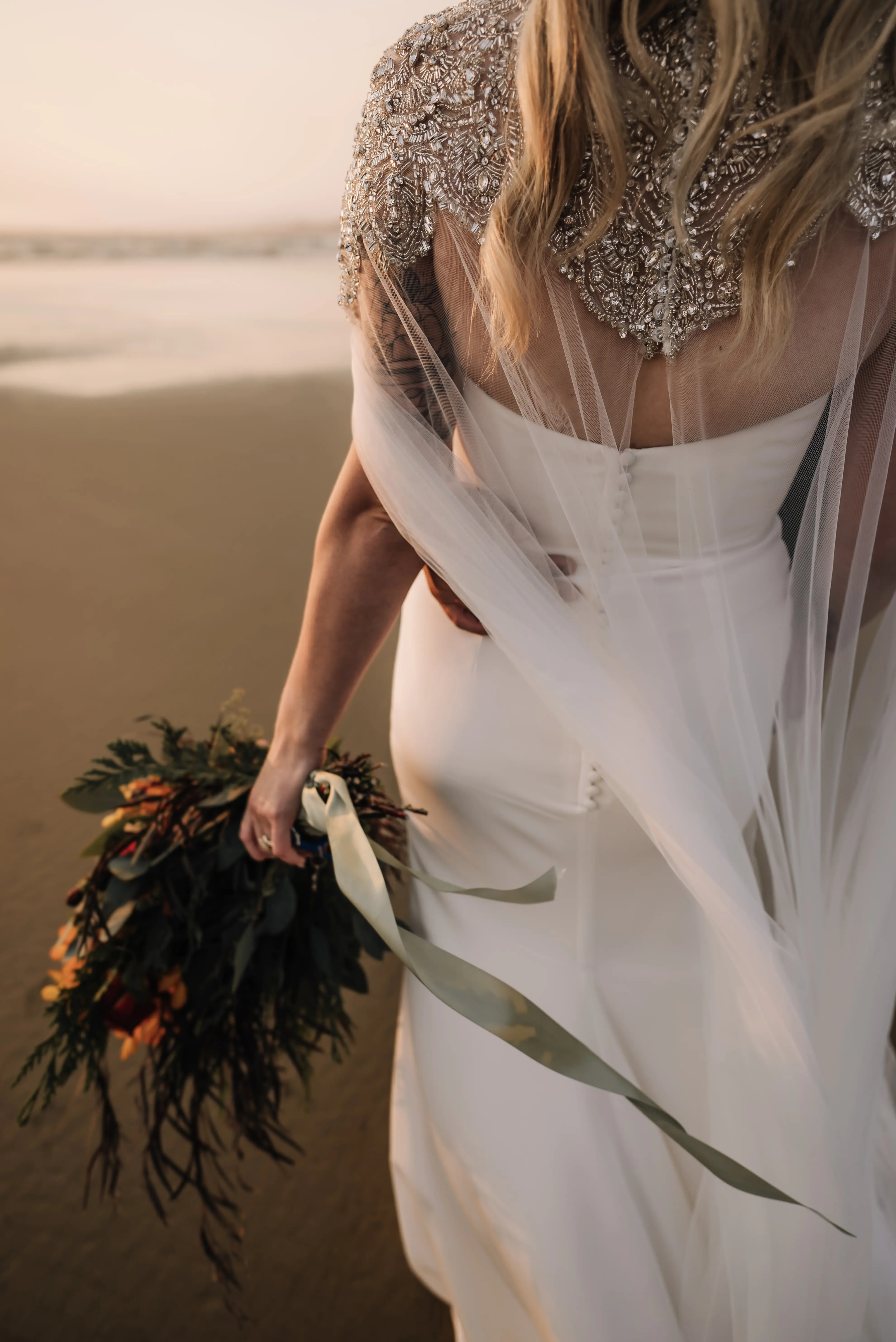 Bride wearing Summer wedding dress by Maggie Sottero