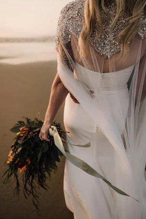 Bride wearing Summer wedding dress by Maggie Sottero