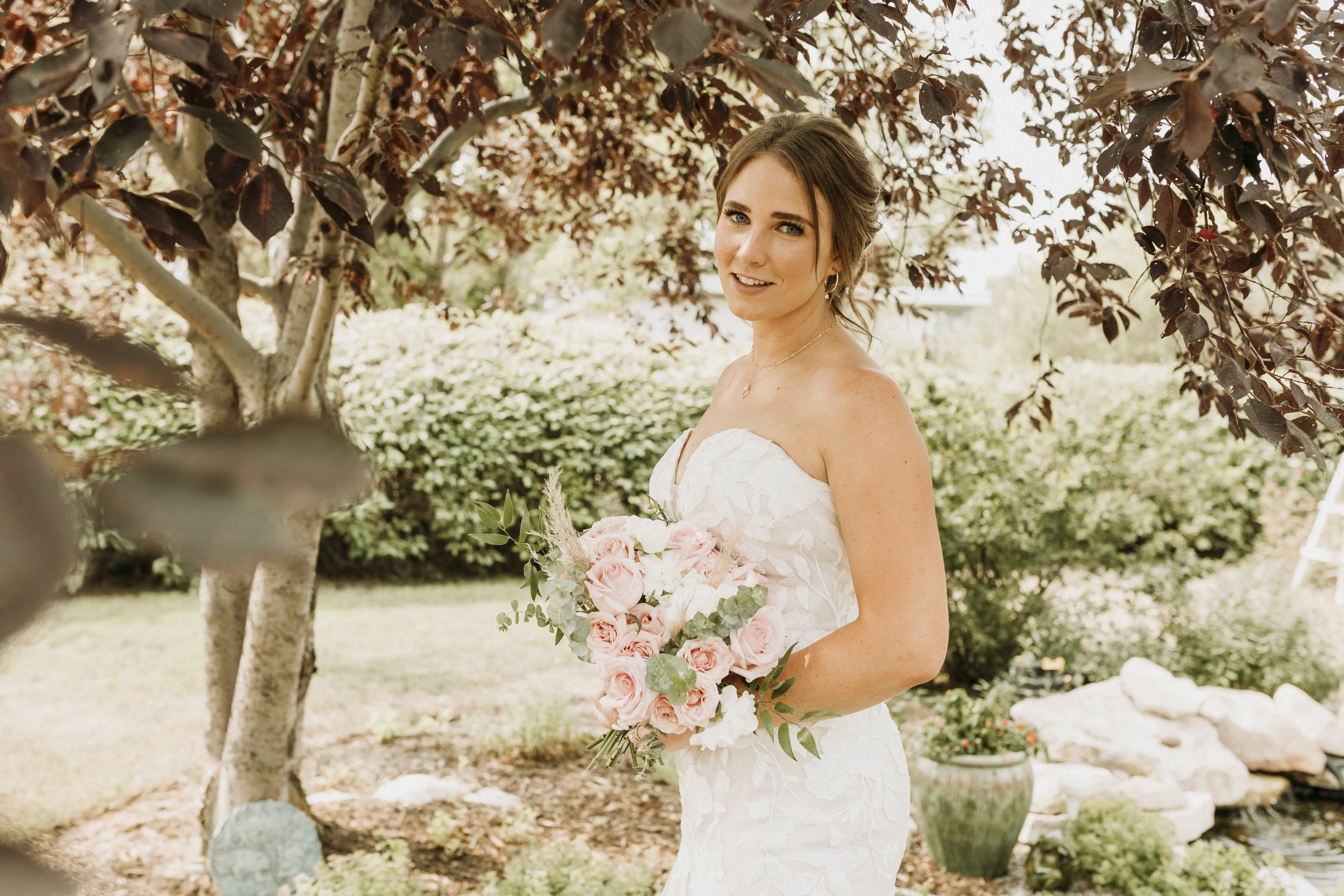 Bride wearing strapless mermaid wedding dress