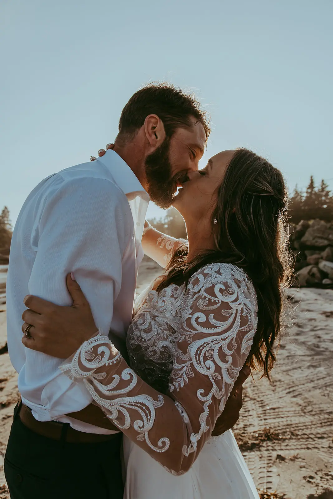 Groom With Bride Wearing Illusion Lace Long Sleeved Wedding Dress Lorraine Dawn By Rebecca Ingram