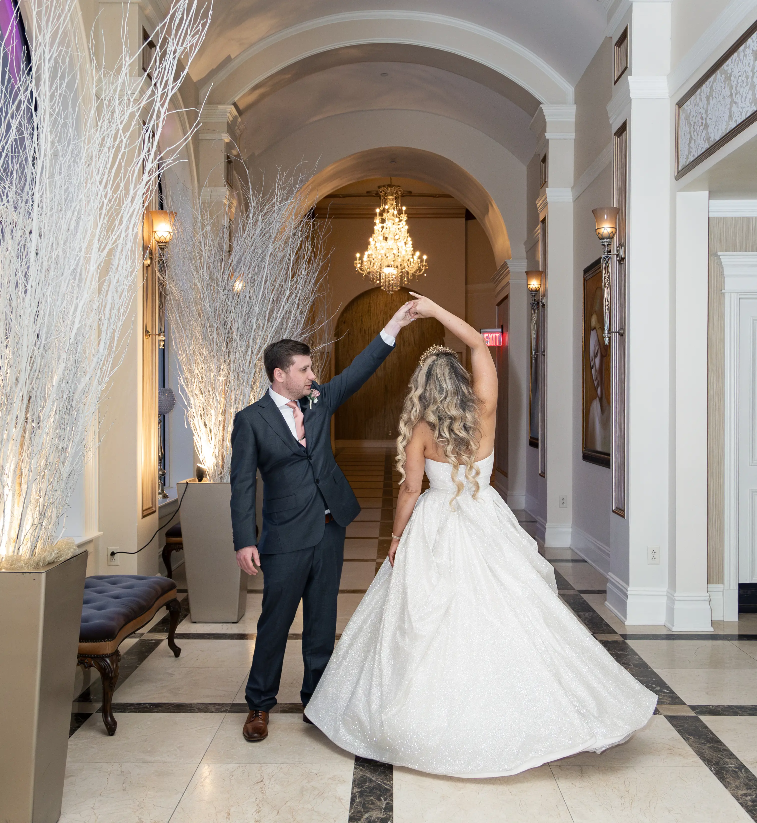Bride wearing Anniston by Maggie Sottero dancing with her husband