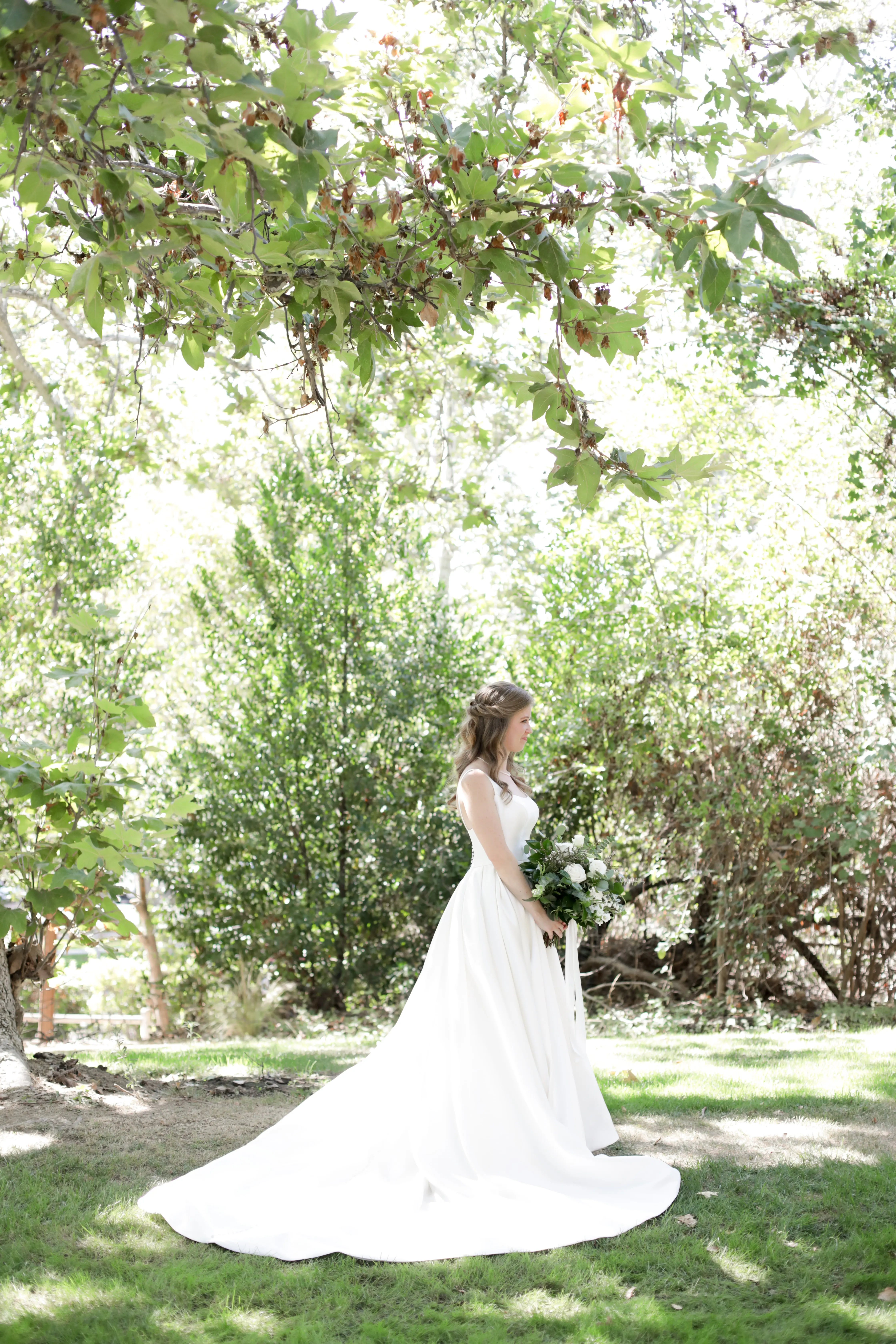 Bride wearing Simple Ballgown Wedding Dress called Selena by Maggie Sottero