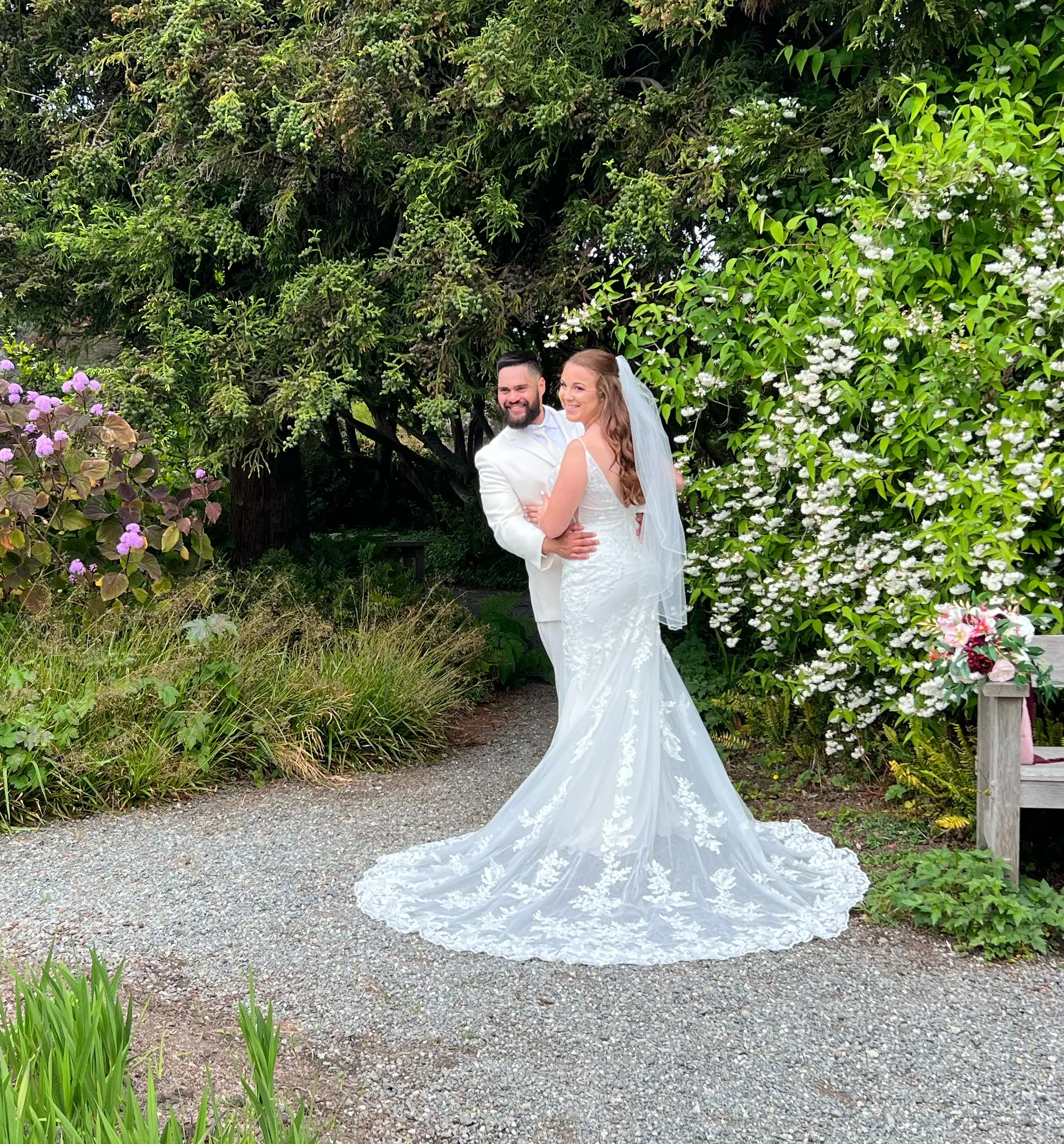 Bride In Lace Wedding Dress With Lace Train Called Fontaine By Maggie Sottero