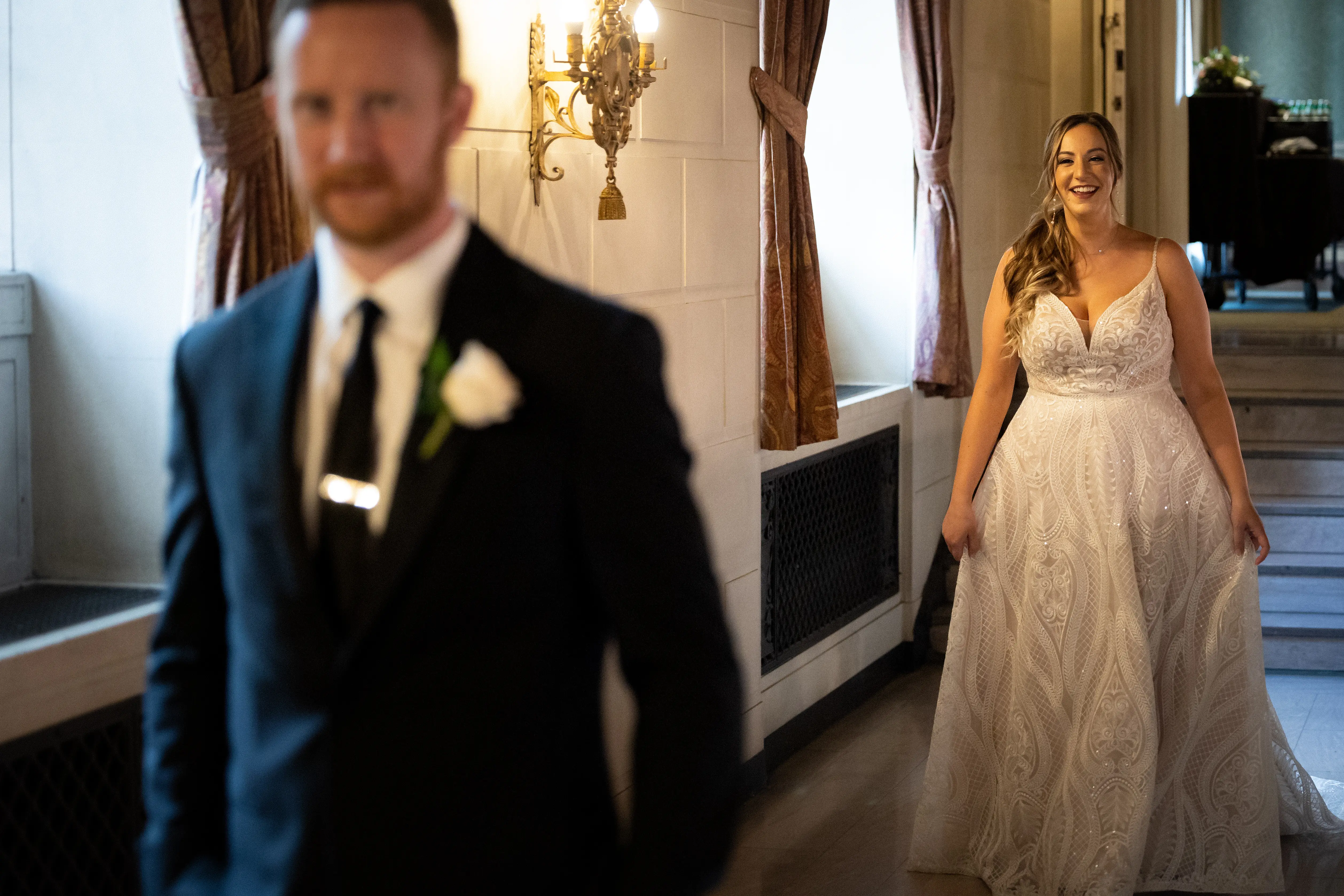 Bride Wearing Glam Princess A-Line Wedding Dress Called Roxanne By Sottero And Midgley Doing The First Look With The Groom