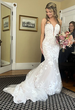Bride wearing Hattie Marie by Rebecca Ingram