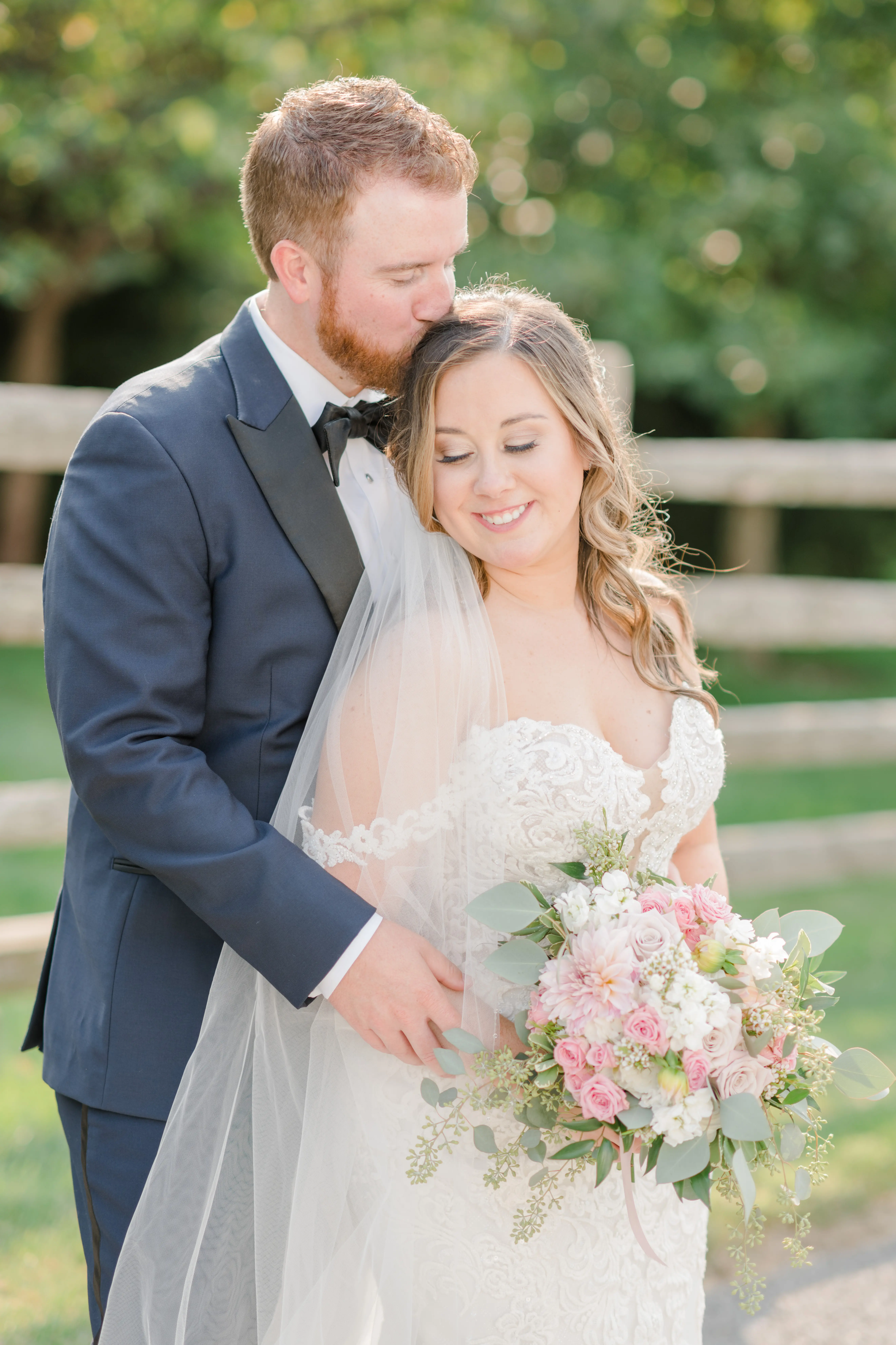 Real bride in sparkly lace fit-and-flare bridal dress with plunging illusion sweetheart neckline called Fiona by Maggie Sottero