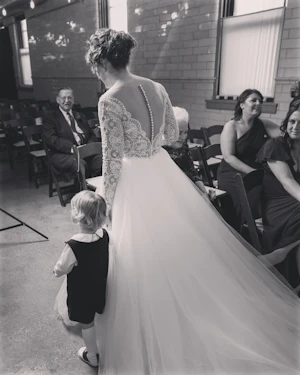 Bride Wearing Long Sleeve Ballgown Mallory Dawn By Maggie Sottero